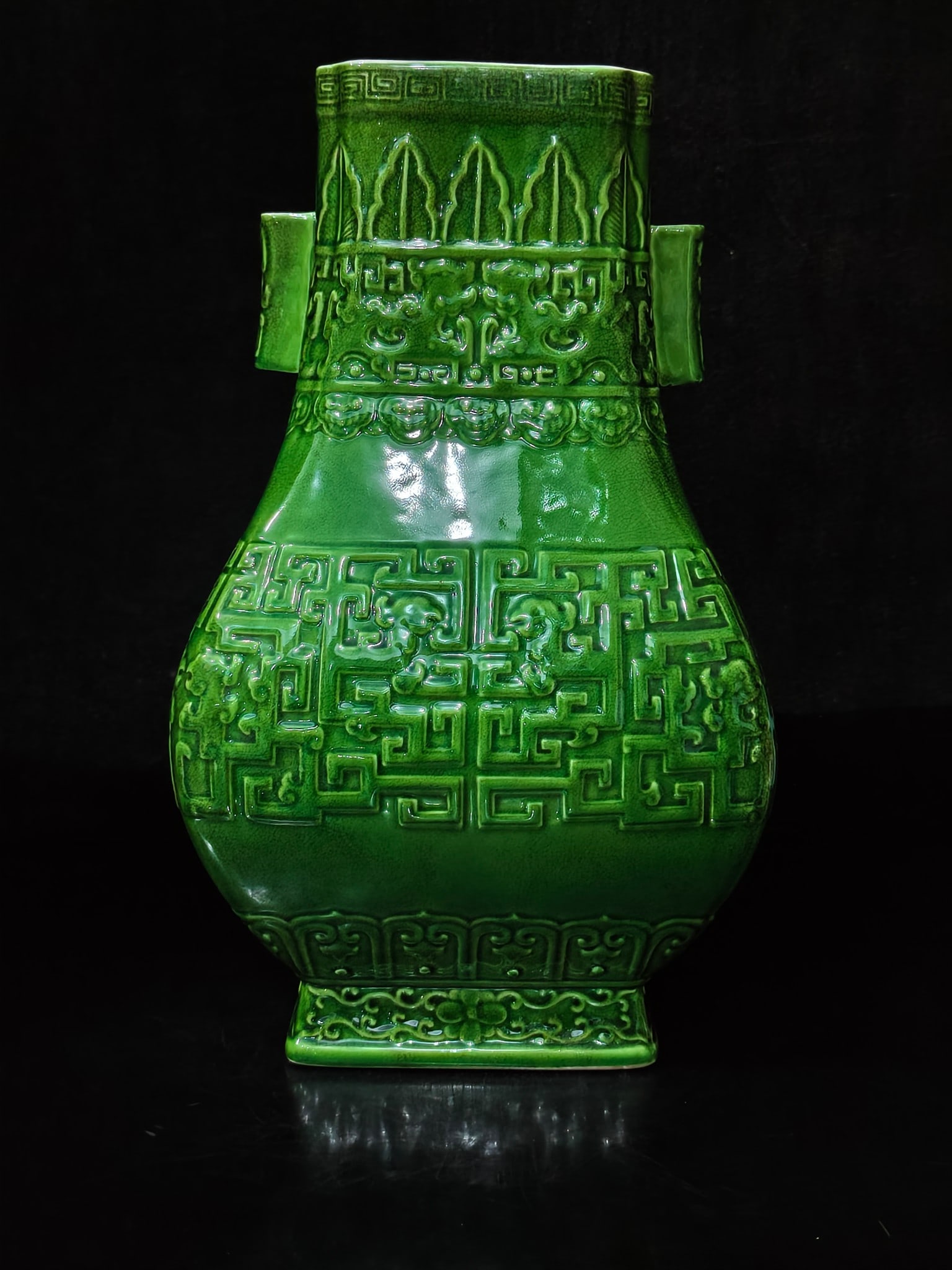 A Exquisite Green Glazed Dragon Pattern Double-Ears Vase: A Exquisite Green Glazed Dragon Pattern Double-Ears Vase,Qing Dynasty, China,Qianlong Six-character Mark,Size:11.4inx6.7inx3.9in