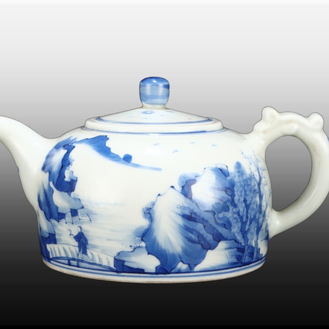A Exquisite Blue and White Landscape Pattern Ewer: A Exquisite Blue and White Landscape Pattern Ewer,Republic of China,With Mark,Size:3.3inx6.3in 青花山水纹壶,民国,带款