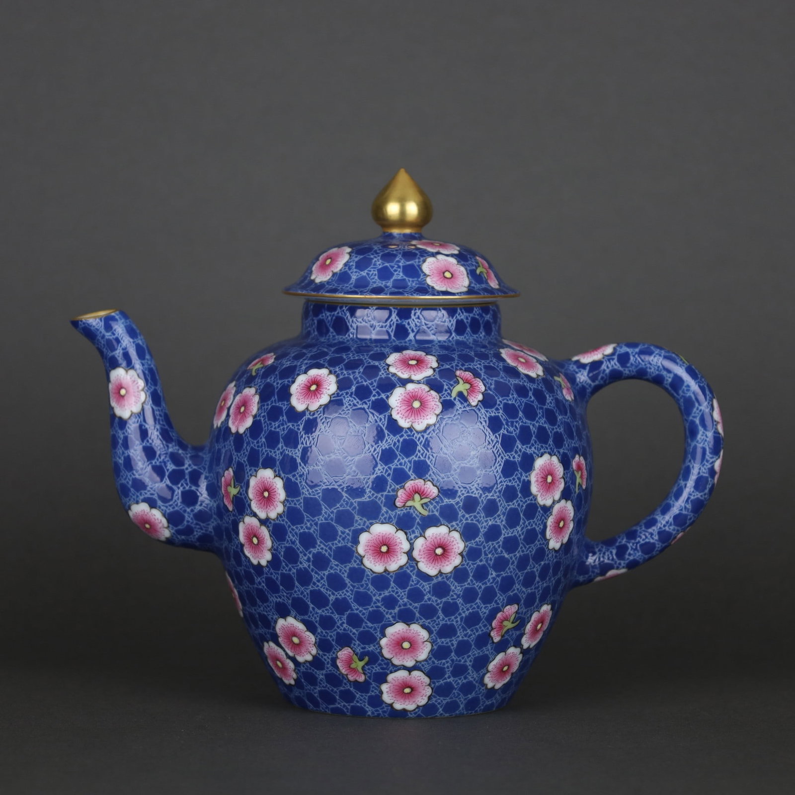 A Exquisite Famille Rose Blue Ground Plum Flower Pattern Pot: A Exquisite Famille Rose Blue Ground Plum Flower Pattern Pot,Qing Dynasty, China,Qianlong Six-character Mark,Size:6.7inx8.1in 粉彩蓝地梅花纹壶,中&