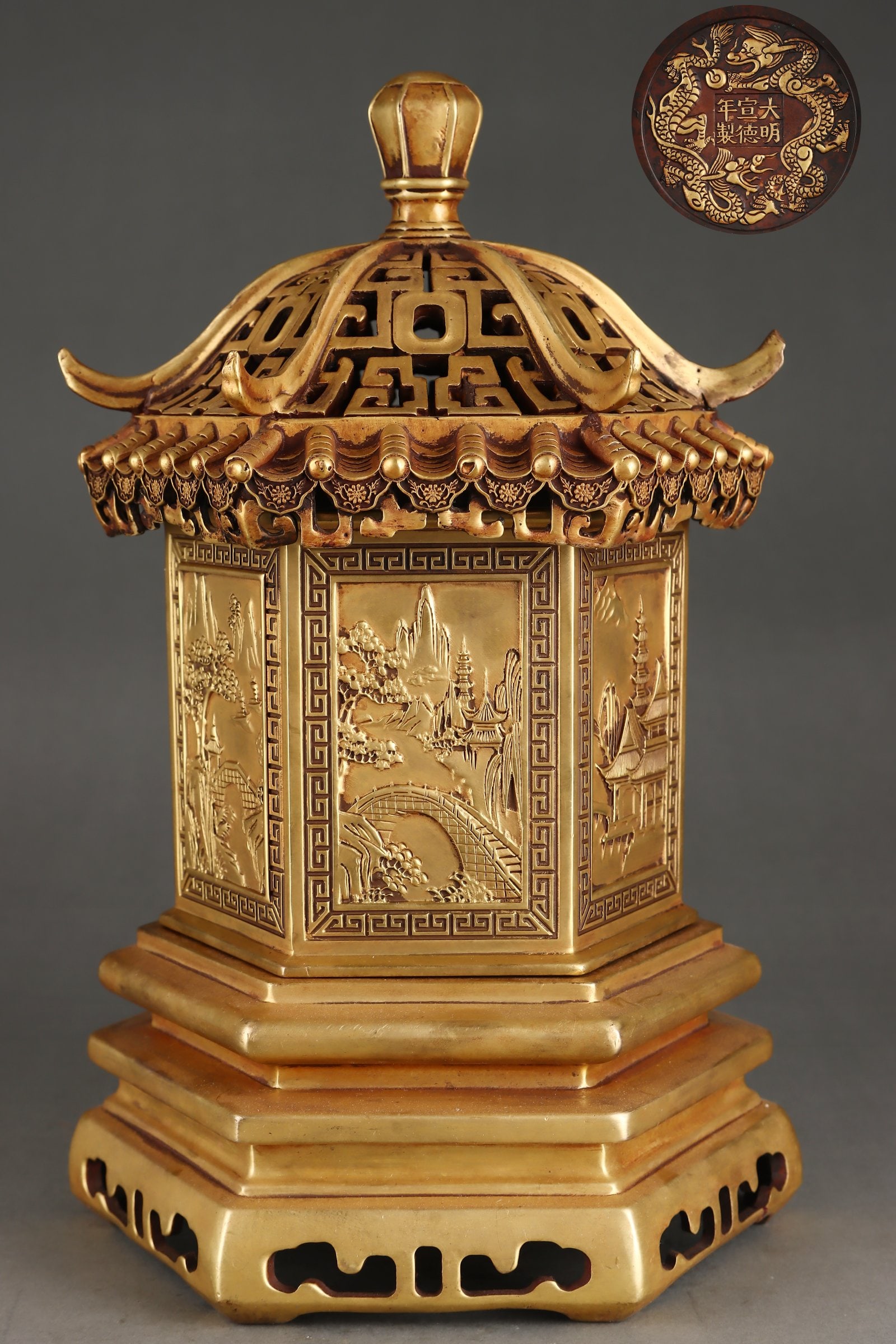 A Exquisite Gilt Bronze Landscape Pattern Censer: A Exquisite Gilt Bronze Landscape Pattern Censer,Ming Dynasty, China,Xuande Six-character Mark,Size:12.8inx5.4inx7.3in,Weight:8450g