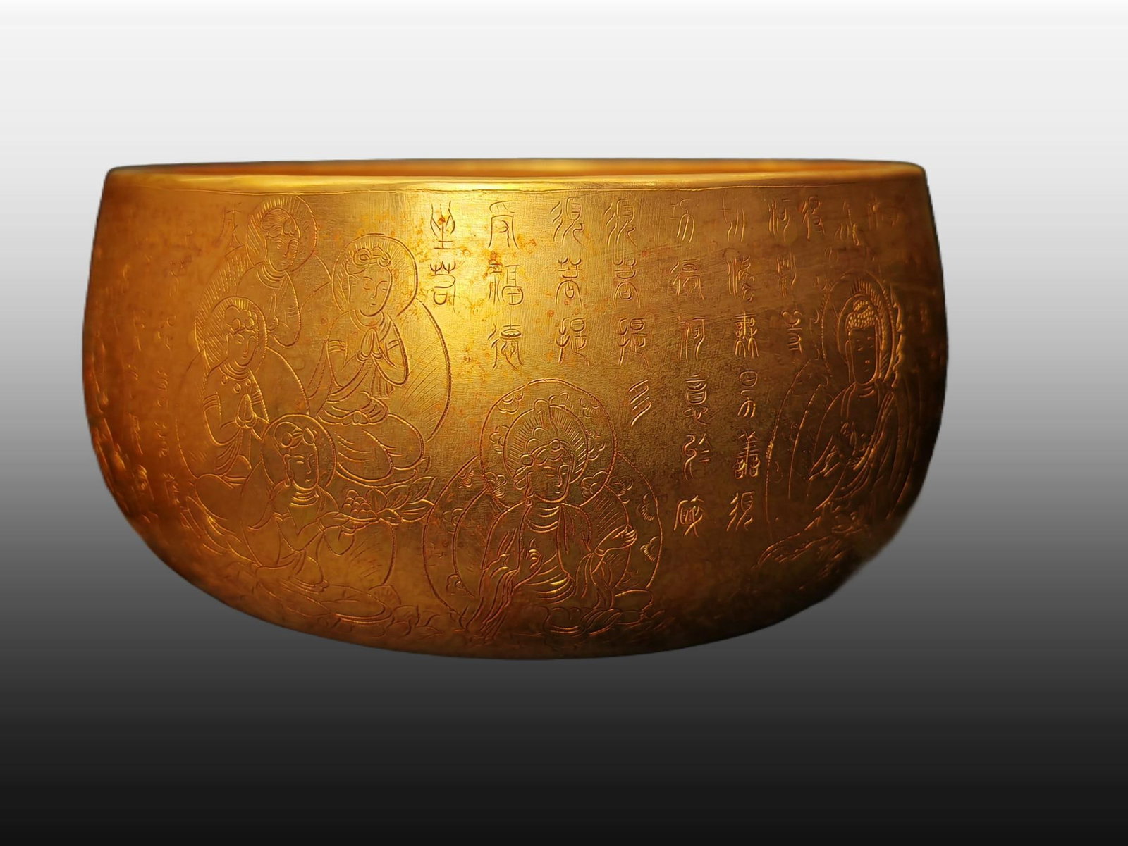 A Exquisite Gilt Bronze Buddha statue Pattern Bowl: A Exquisite Gilt Bronze Buddha statue Pattern Bowl,Tang Dynasty, China,Size:6.3inx3.5in,Weight:1250g 铜鎏金佛像纹钵,中国唐代