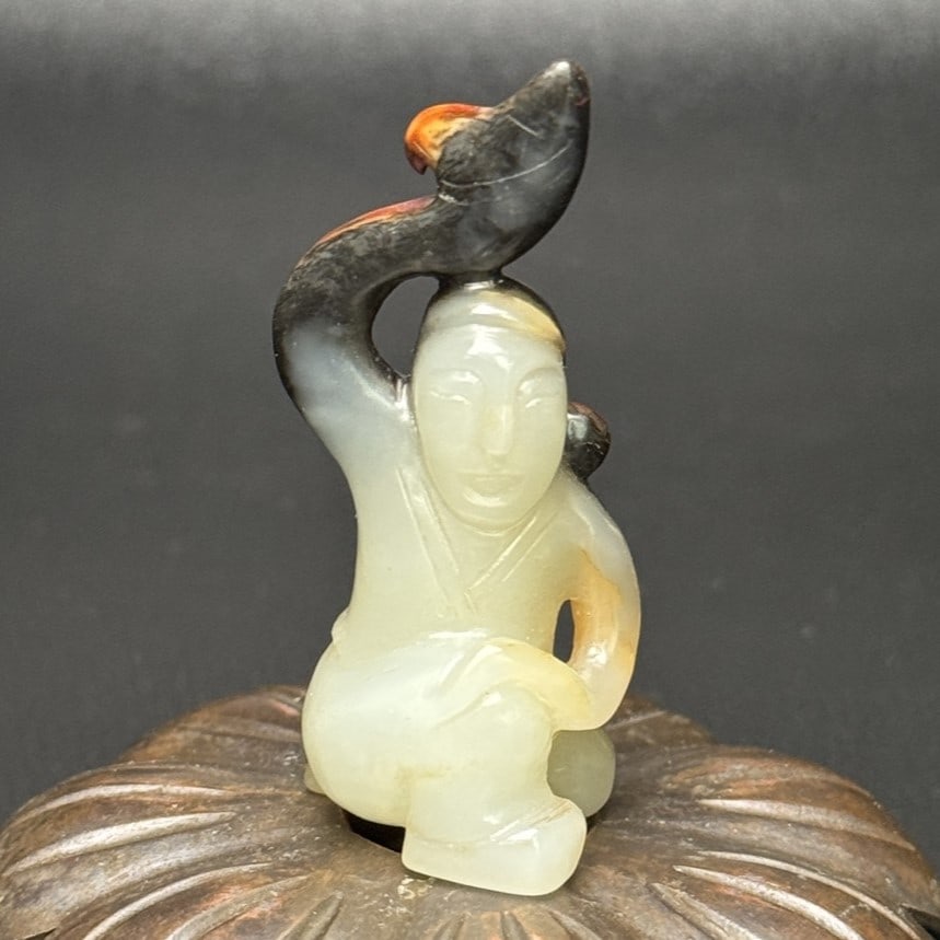 A Exquisite Hotan Jade Human-shaped Handheld Carving: A Exquisite Hotan Jade Human-shaped Handheld Carving,Han Dynasty, China,Size:1.9inx0.8inx0.7in,Weight:15g