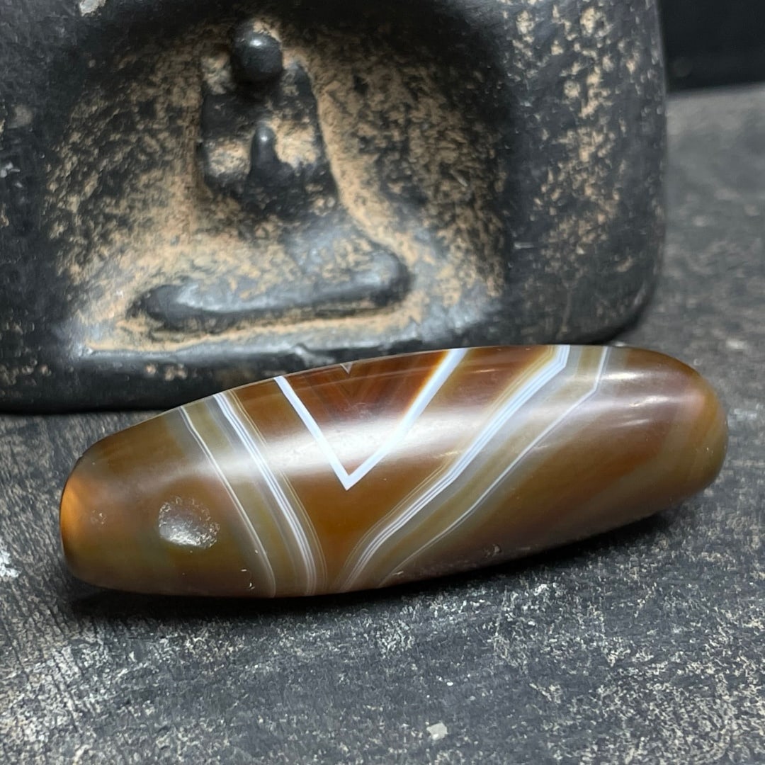 A Exquisite Tiger Tooth Dzi bead - 2