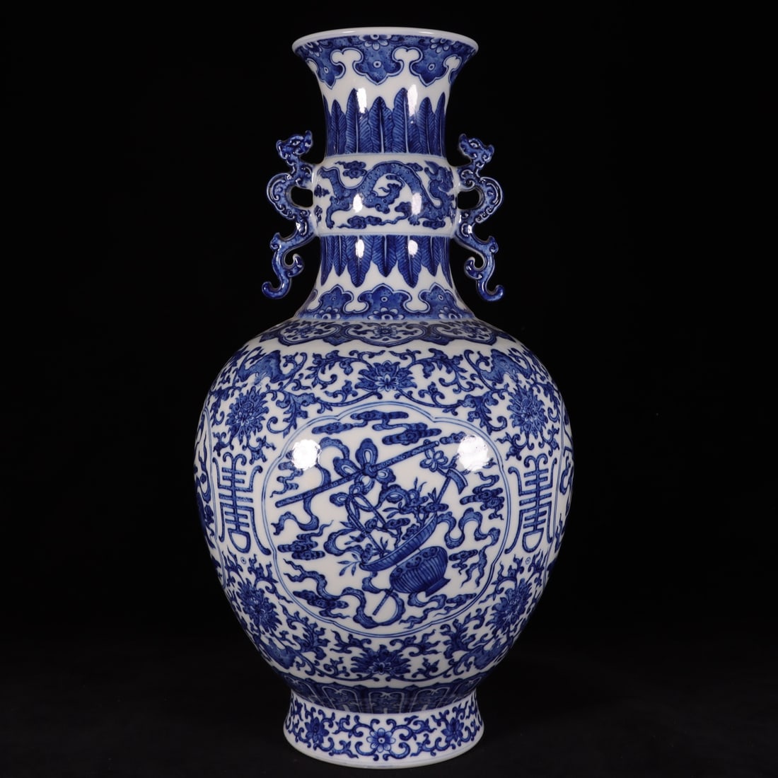 A Exquisite Blue and White Interlocking Lotus Eight Treasures Pattern Vase: A Exquisite Blue and White Interlocking Lotus Eight Treasures Pattern Vase,Qing Dynasty, China,Qianlong Six-character Mark,Size:15.9inx8.1inx4.7in 青花缠枝莲八ê
