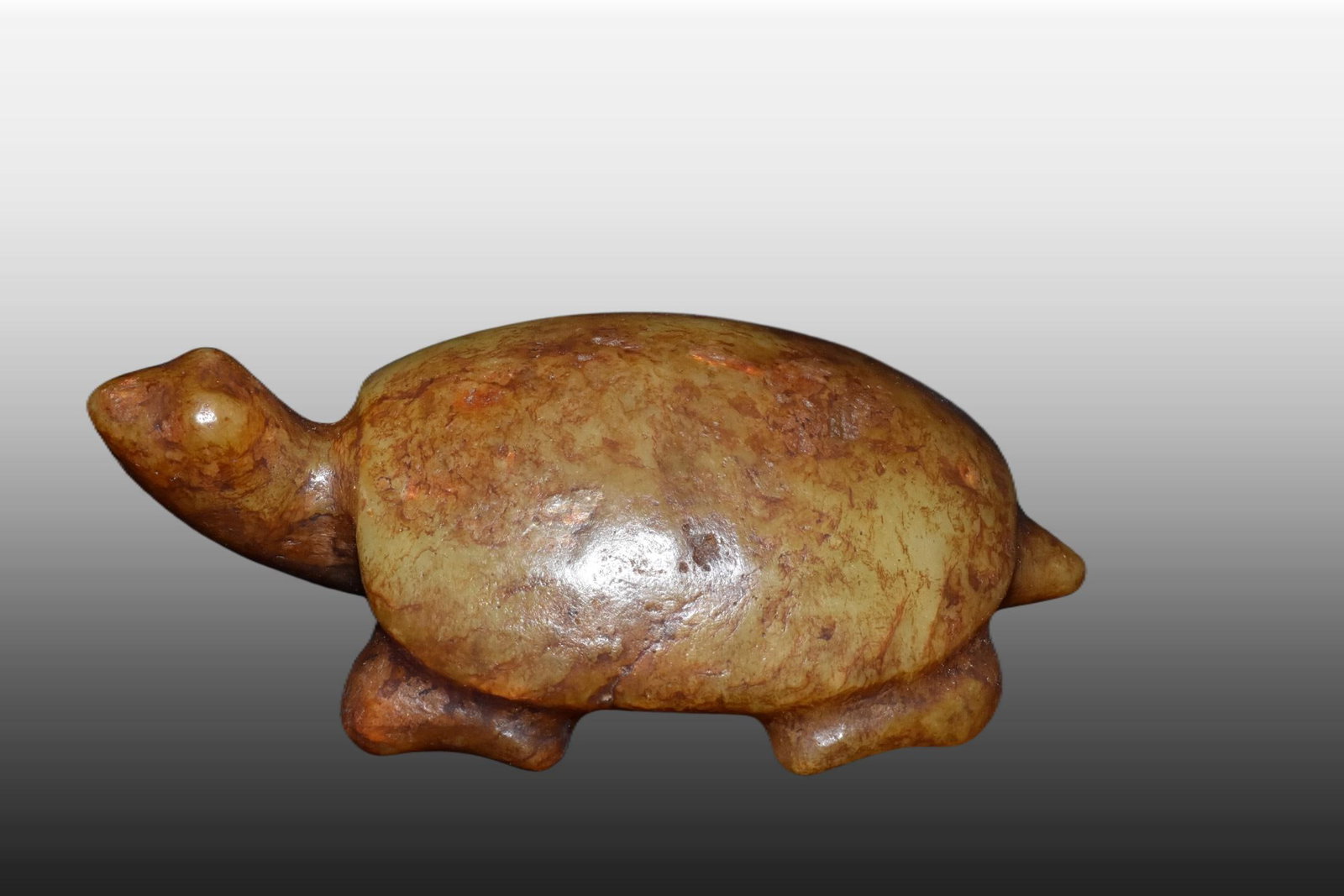 A Exquisite Gaogu Jade Tortoise Ornament: A Exquisite Gaogu Jade Tortoise Ornament,Ancient Time, China,Size:2.2inx3.9in,Weight:150g 高古玉龟摆件,远古时期