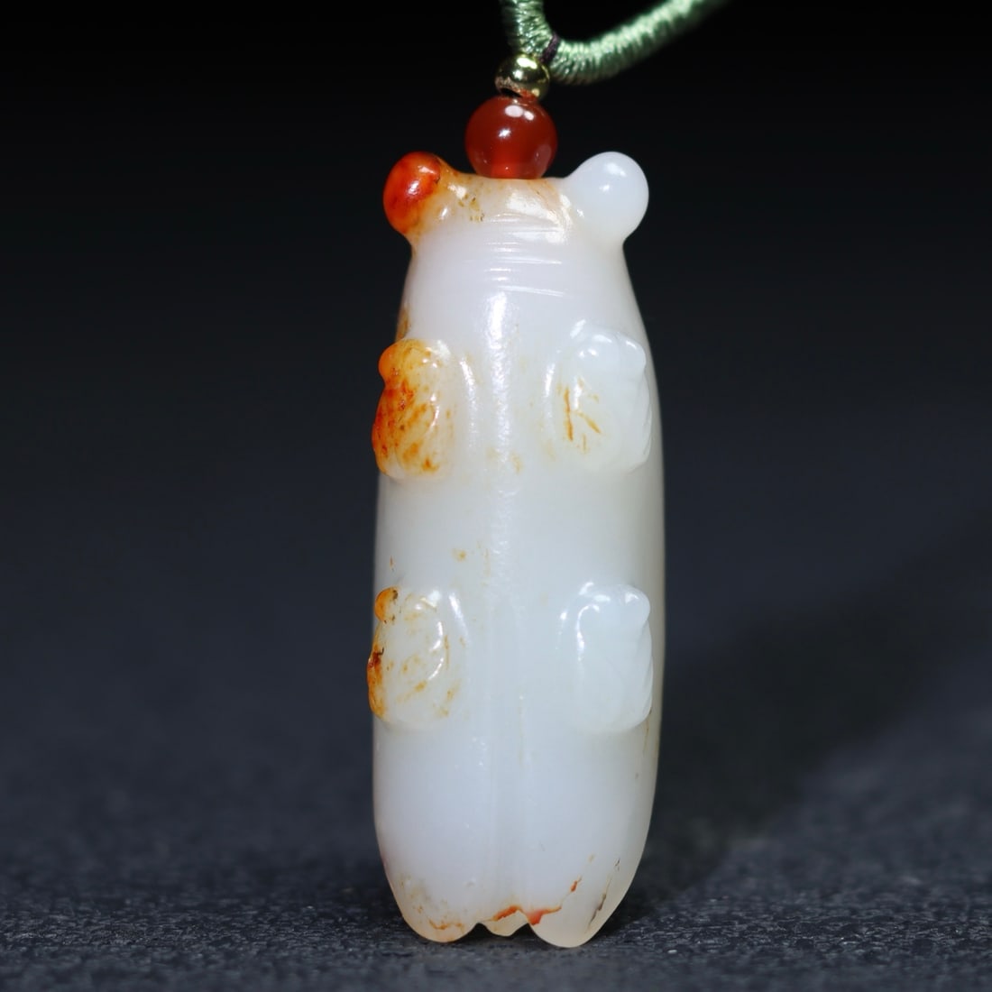 A Exquisite Hotan Jade Cicada: A Exquisite Hotan Jade Cicada,Qing Dynasty, China,Size:1.7inx0.6inx0.5in ,Weight:14.6g 和田玉蝉,中国清代
