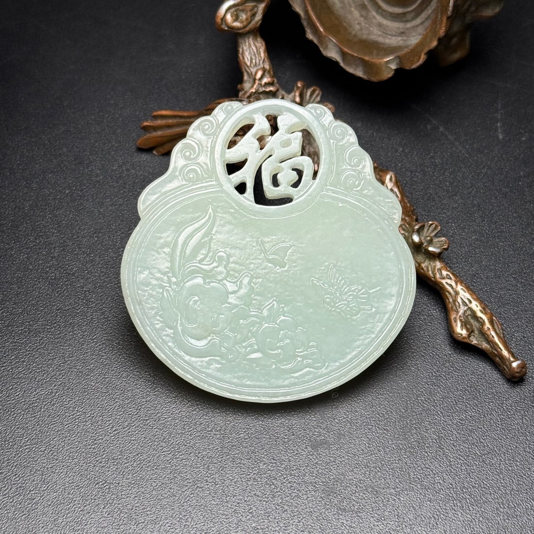 A Exquisite Hotan Jade Flower and Fruit Pattern Jade Pendant: A Exquisite Hotan Jade Flower and Fruit Pattern Jade Pendant,Qing Dynasty, China,Size:2.1inx2inx0.2in,Weight:31g 和田玉瓜果纹玉佩,中国଀