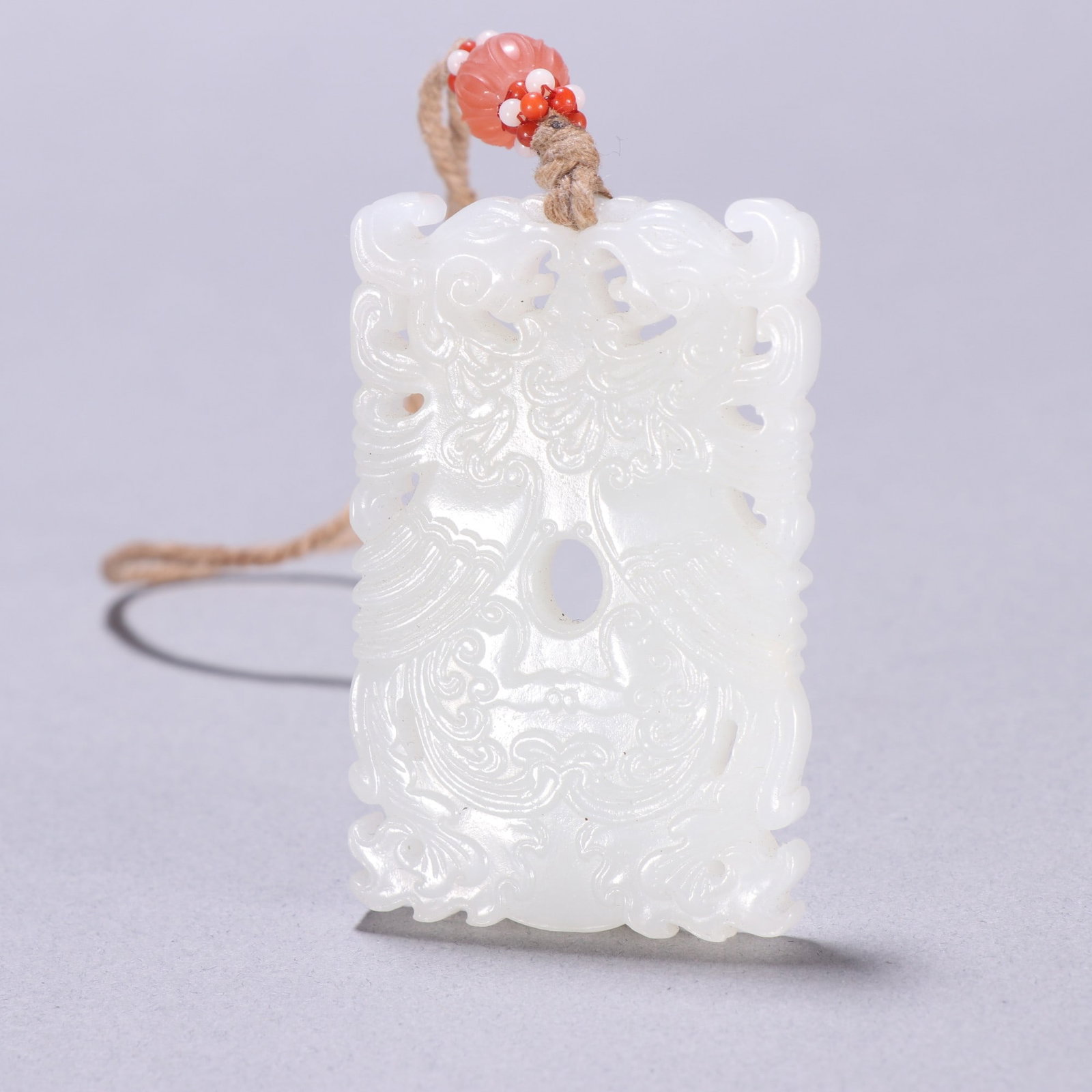 A Exquisite Hotan Jade Phoenix Pattern Brand: A Exquisite Hotan Jade Phoenix Pattern Brand,Qing Dynasty, China,Size:2.3inx1.5in,Weight:35g 和田玉凤牌,中国清代