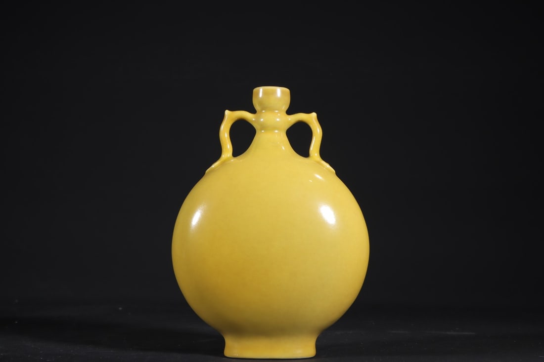 A Exquisite Yellow Glazed Double-Ears Vase: A Exquisite Yellow Glazed Double-Ears Vase,Qing Dynasty, China,Qianlong Six-character Mark,Size:6.5inx4.7in 黄釉双耳瓶,中国清代,乾隆&#