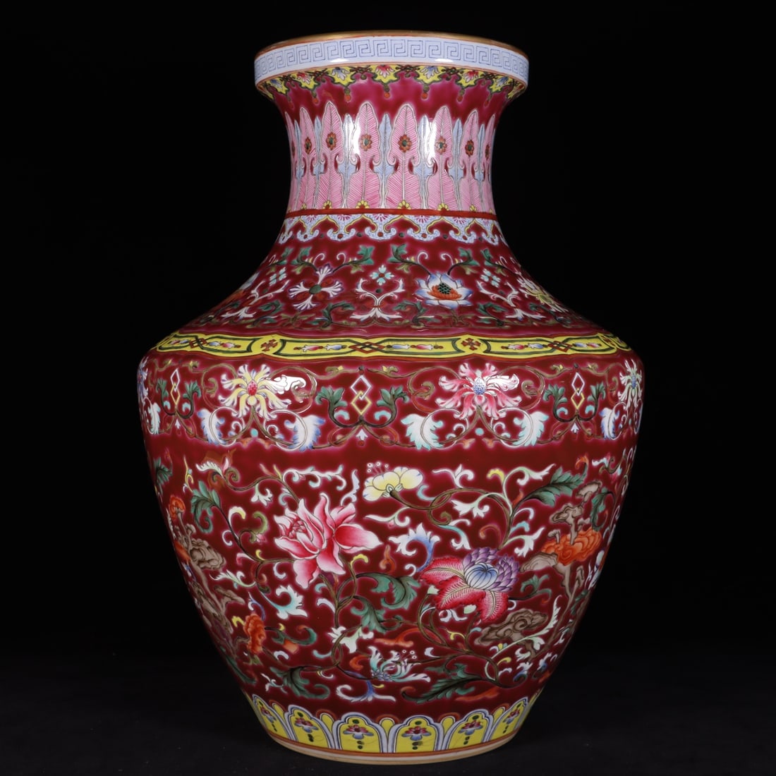 A Exquisite Famille-Rose Ruby Red Ground Interlocking Lotus Flower Pattern Vase: A Exquisite Famille-Rose Ruby Red Ground Interlocking Lotus Flower Pattern Vase,Qing Dynasty, China,Qianlong Six-character Mark,Size:15.2inx6.1inx11inx5.5in 粉彩胭脂红