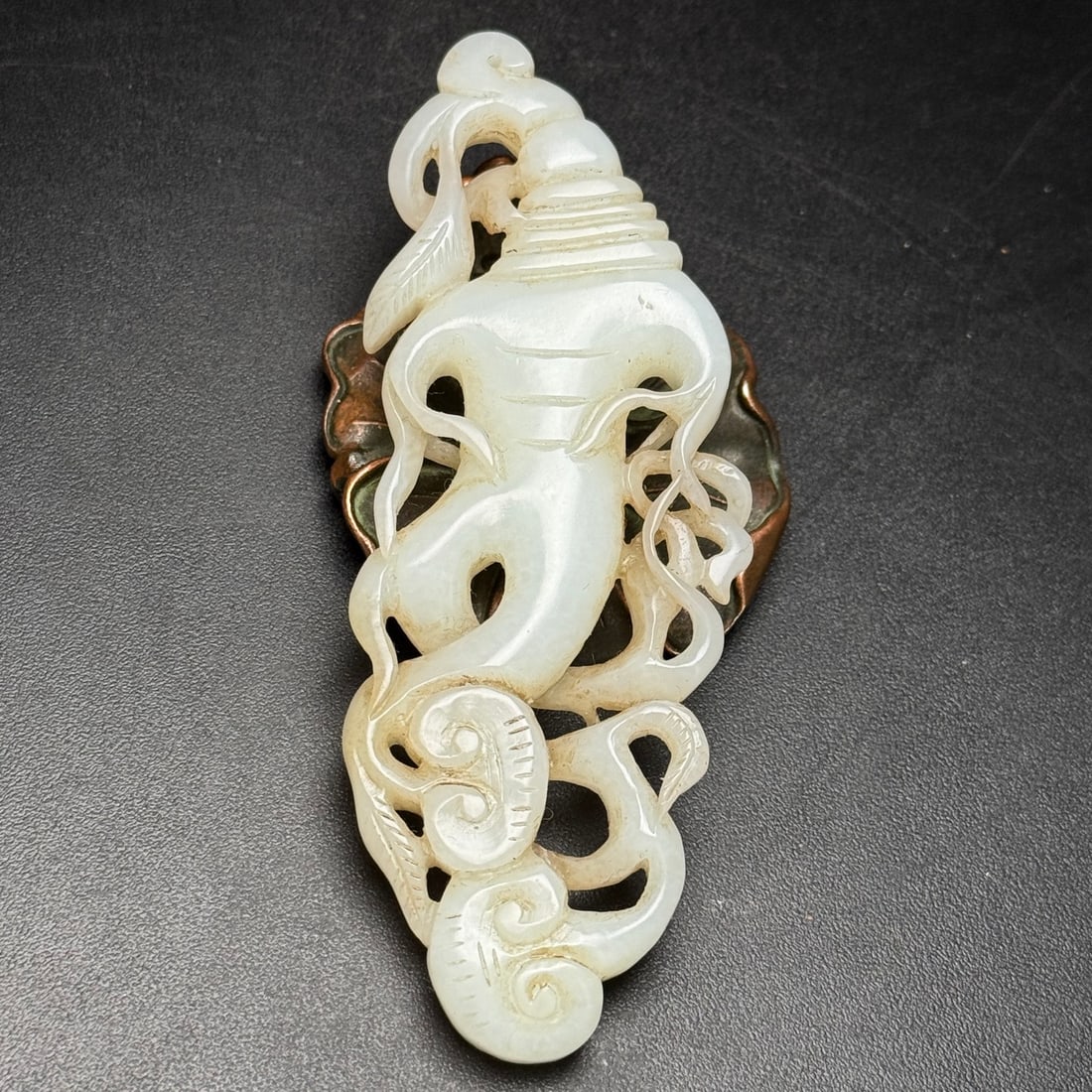 A Exquisite Hotan Jade Ginseng Ruyi Ornament: A Exquisite Hotan Jade Ginseng Ruyi Ornament,Qing Dynasty, China,Size:4.1inx1.5inx0.4in,Weight:46g