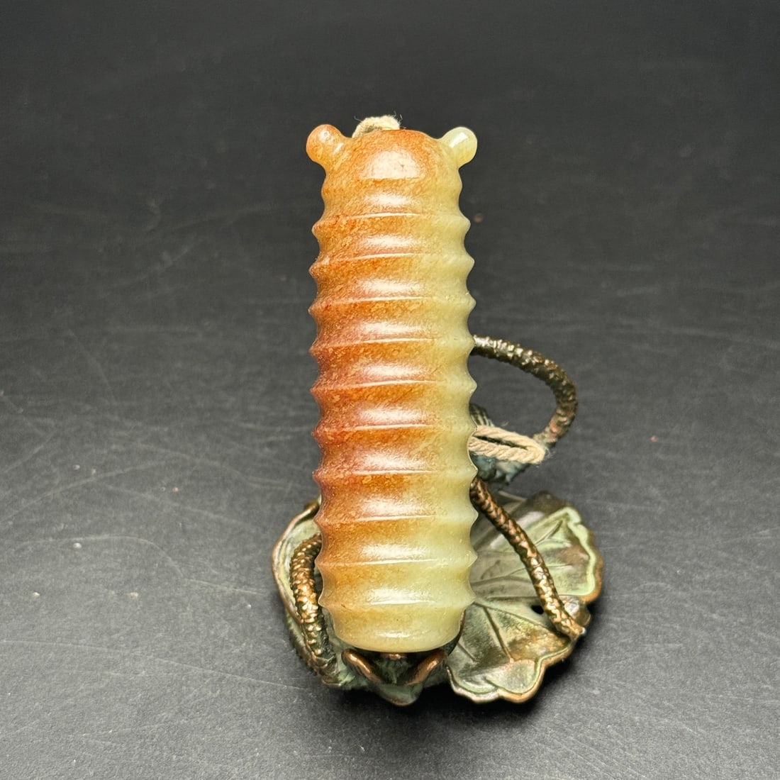 A Exquisite Hotan Jade Cicada Handheld Carving: A Exquisite Hotan Jade Cicada Handheld Carving,Han Dynasty, China,Size:2.8inx0.9inx0.9in,Weight:61g 和田玉蝉手把件,中国汉代