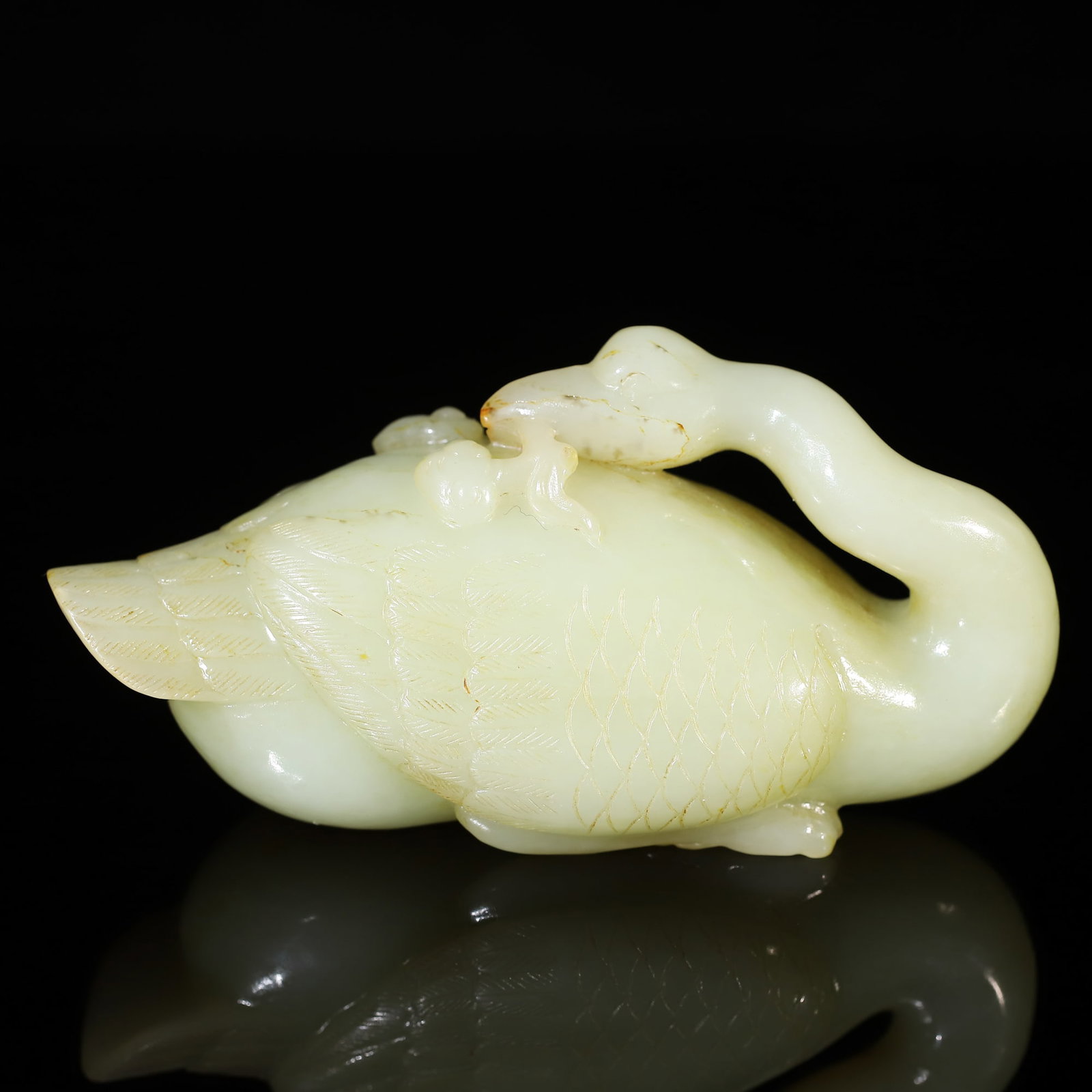 A Exquisite Hotan Jade Goose Ornament: A Exquisite Hotan Jade Goose Ornament,Qing Dynasty, China,Size:4.7inx1.9inx2.4in 和田玉鹅摆件,中国清代