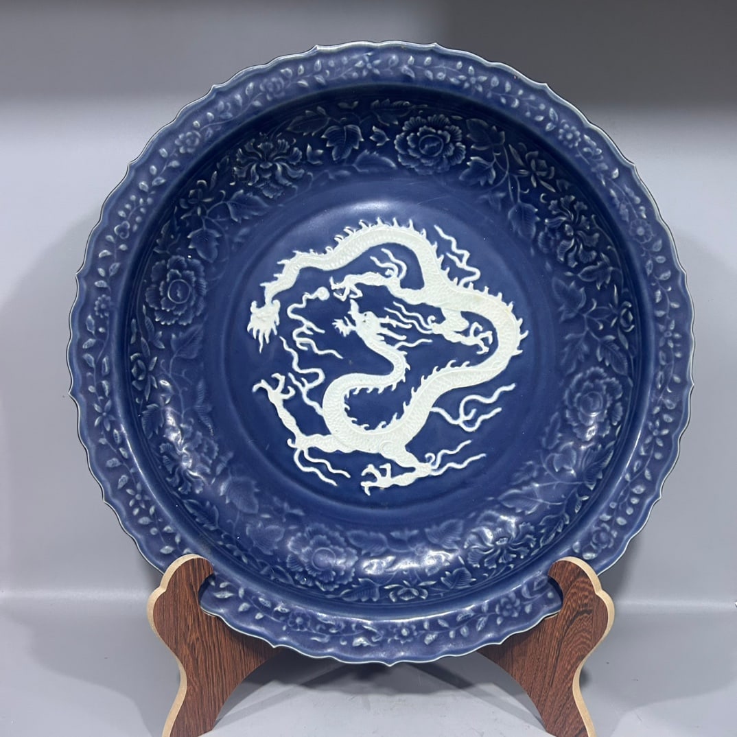 A Exquisite Ji Blue Glazed Dragon Pattern Plate: A Exquisite Ji Blue Glazed Dragon Pattern Plate,Ming Dynasty, China,Size:17.8inx2.8in 霁蓝釉龙纹盘,中国明代
