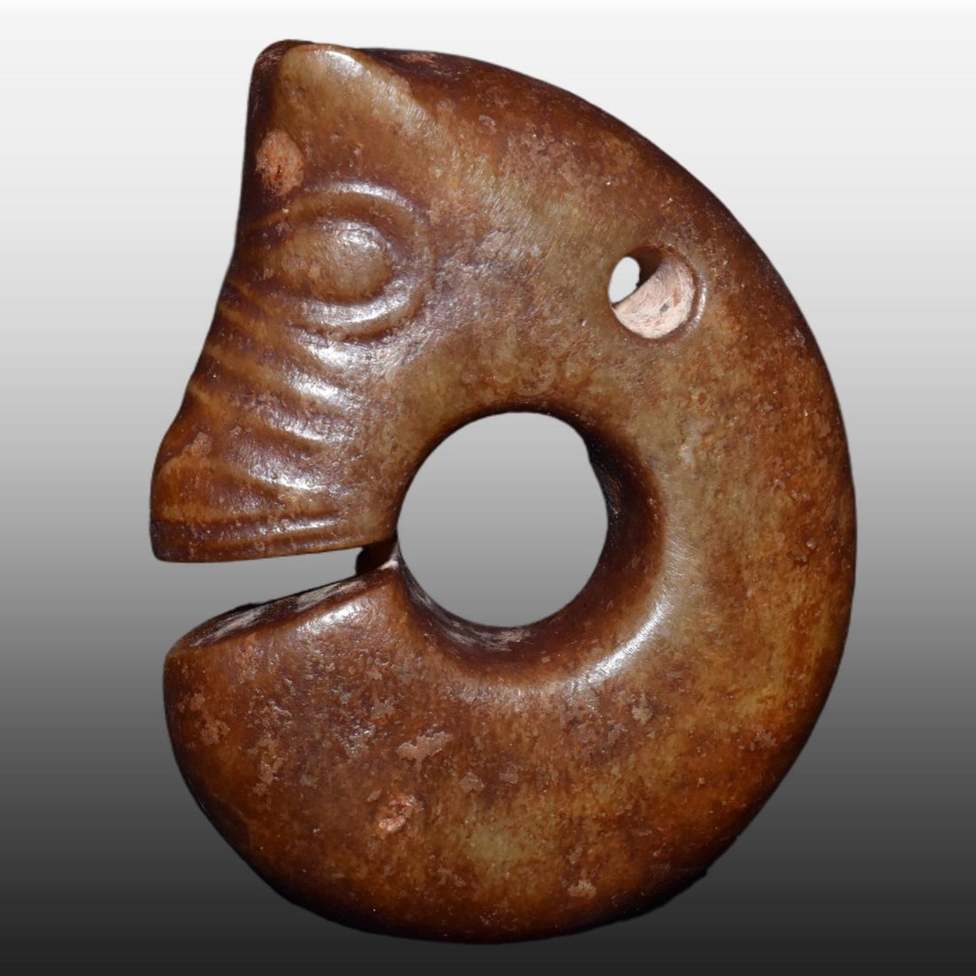 A Exquisite Gaogu Jade Pig Dragon: A Exquisite Gaogu Jade Pig Dragon,Ancient Time, China,Size:2.4inx3.1in,Weight:170g 高古玉猪龙,远古时期
