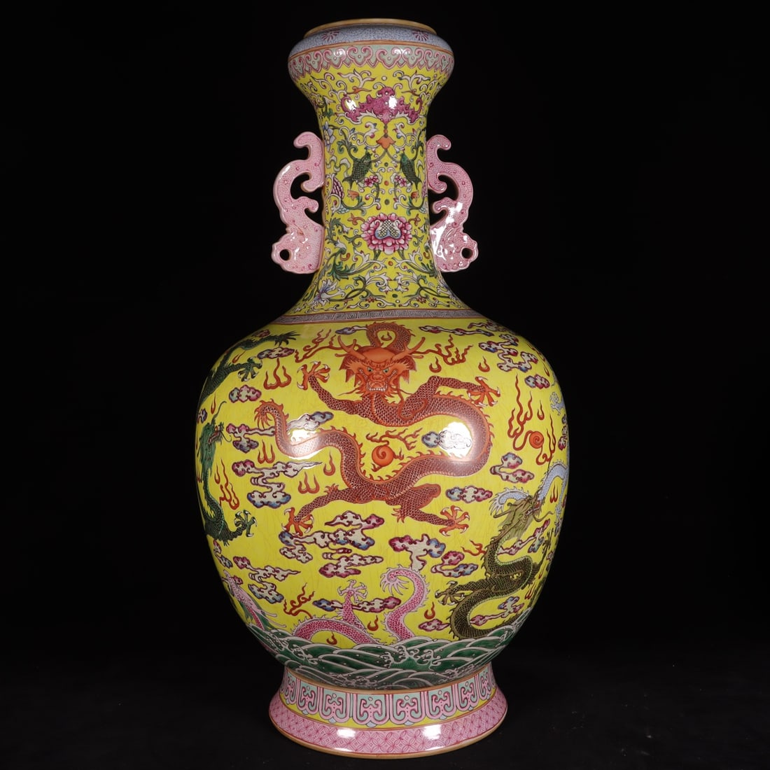 A Exquisite Yellow Ground Famille-Rose Dragon Pattern Double-Ears Vase: A Exquisite Yellow Ground Famille-Rose Dragon Pattern Double-Ears Vase,Qing Dynasty, China,Qianlong Six-character Mark,Size:20.9inx3.9inx11.4inx7.3in 黄地粉彩龙纹&#
