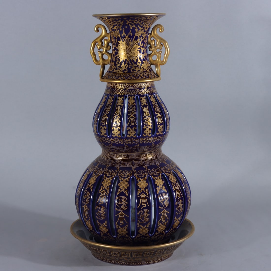 A Exquisite Famille-Rose Celestial Blue Glaze Painted Gold Shou Character Pattern Vase: A Exquisite Famille-Rose Celestial Blue Glaze Painted Gold Shou Character Pattern Vase,Qing Dynasty, China,Qianlong Six-character Mark,Size:15.4inx7.5inx5.3in 粉彩天蓝釉&