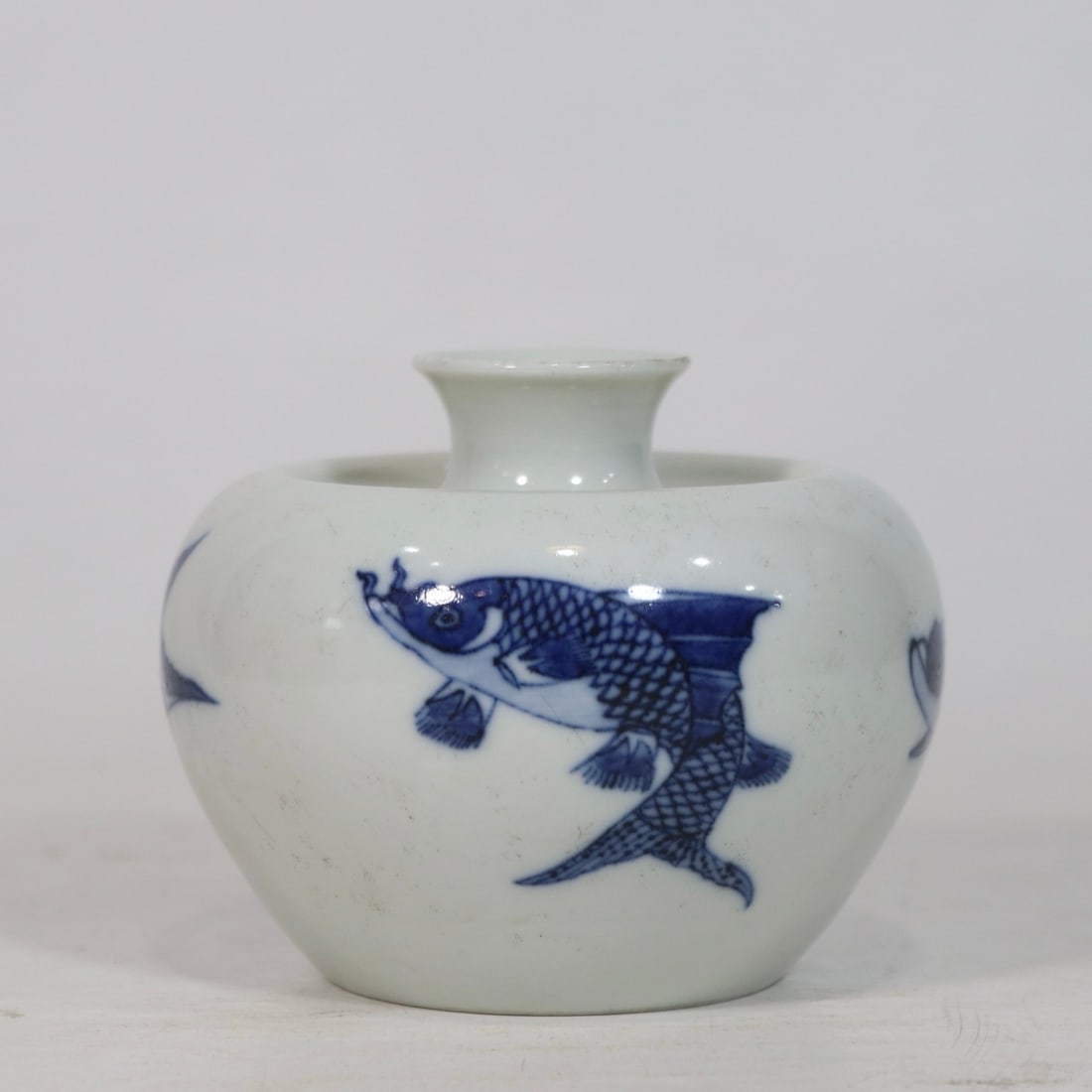 A Exquisite Blue and White Fish Pattern Apple Vase: A Exquisite Blue and White Fish Pattern Apple Vase,Qing Dynasty, China,Yongzheng Six-character Mark,Size:3inx3.7in 青花鱼纹苹果瓶,中国清