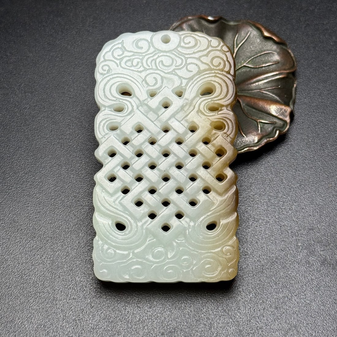 A Exquisite Hotan Jade Plaque: A Exquisite Hotan Jade Plaque,Qing Dynasty, China,Size:2.7inx1.5inx0.3in,Weight:54g 和田玉牌,中国清代