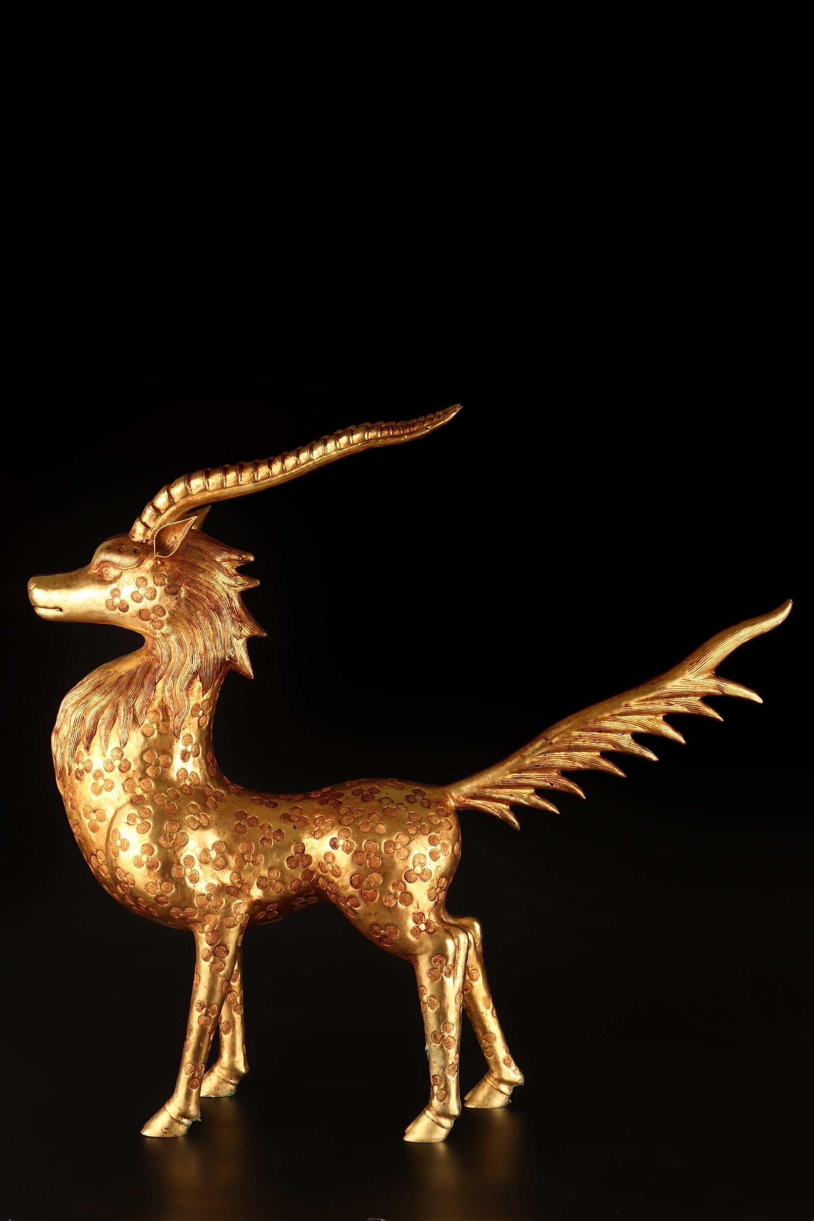 A Exquisite Gilt Bronze Auspicious Beast Ornament: A Exquisite Gilt Bronze Auspicious Beast Ornament,Qing Dynasty, China,Qianlong Four-character Mark,Size:25.6inx26.8in,Weight:6100g 铜鎏金端兽摆件,中