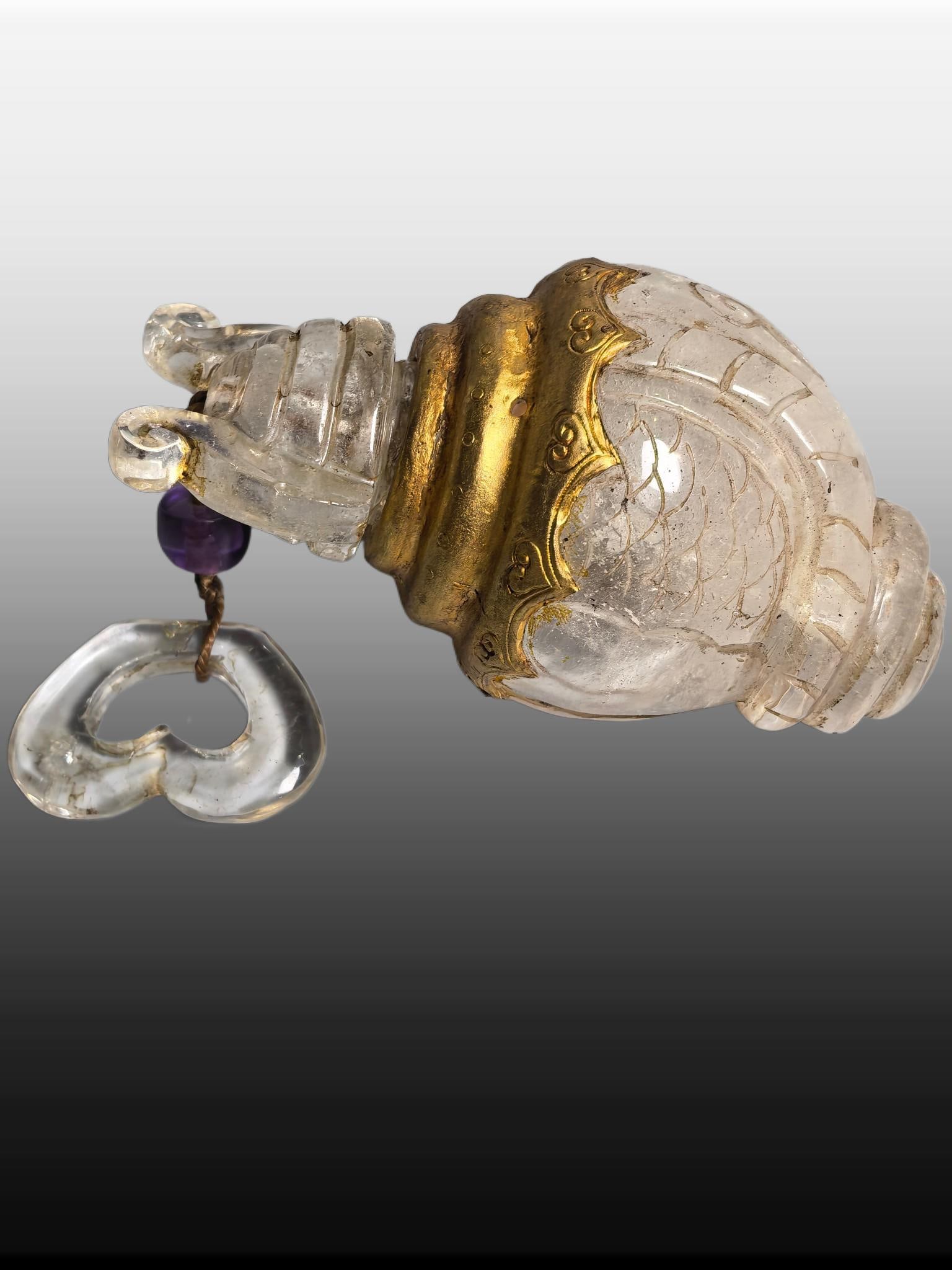 A Exquisite Crystal Gilt Conch Ornament: A Exquisite Crystal Gilt Conch Ornament,Qing Dynasty, China,Size:4.3inx2.4inx2in,Weight:226g 水晶鎏金海螺,中国清代