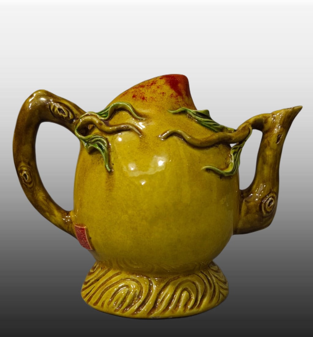 A Exquisite Yellow Glazed Peach-Shaped Ewer: A Exquisite Yellow Glazed Peach-Shaped Ewer,Qing Dynasty, China,Qianlong Four-character Mark,Size:5.5inx6.3in