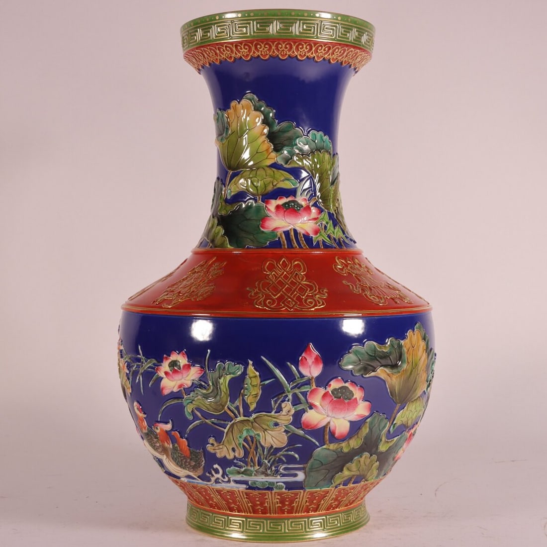 A Exquisite Enamel Ji Blue Glazed Painted Gold Flower and Bird Pattern Vase: A Exquisite Enamel Ji Blue Glazed Painted Gold Flower and Bird Pattern Vase,Qing Dynasty, China,Qianlong Six-character Mark,Size:11.7inx7.1in 珐琅彩霁蓝釉描&#