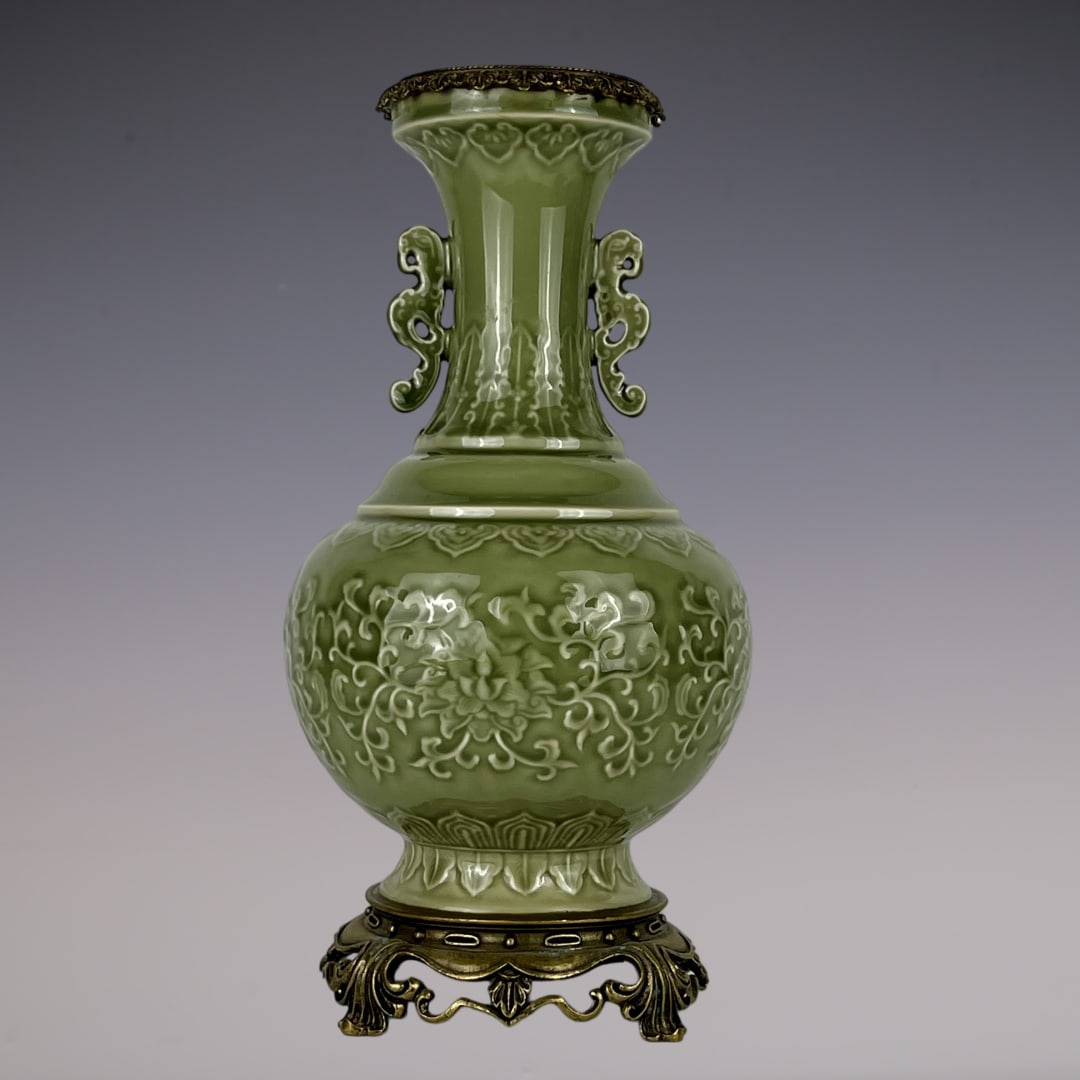 An Exquisite Celadon Glazed Inlaid Bronze Lotus Pattern Double-Ears Vase: An Exquisite Celadon Glazed Inlaid Bronze Lotus Pattern Double-Ears Vase Qing Dynasty, China Qianlong Six-character Mark