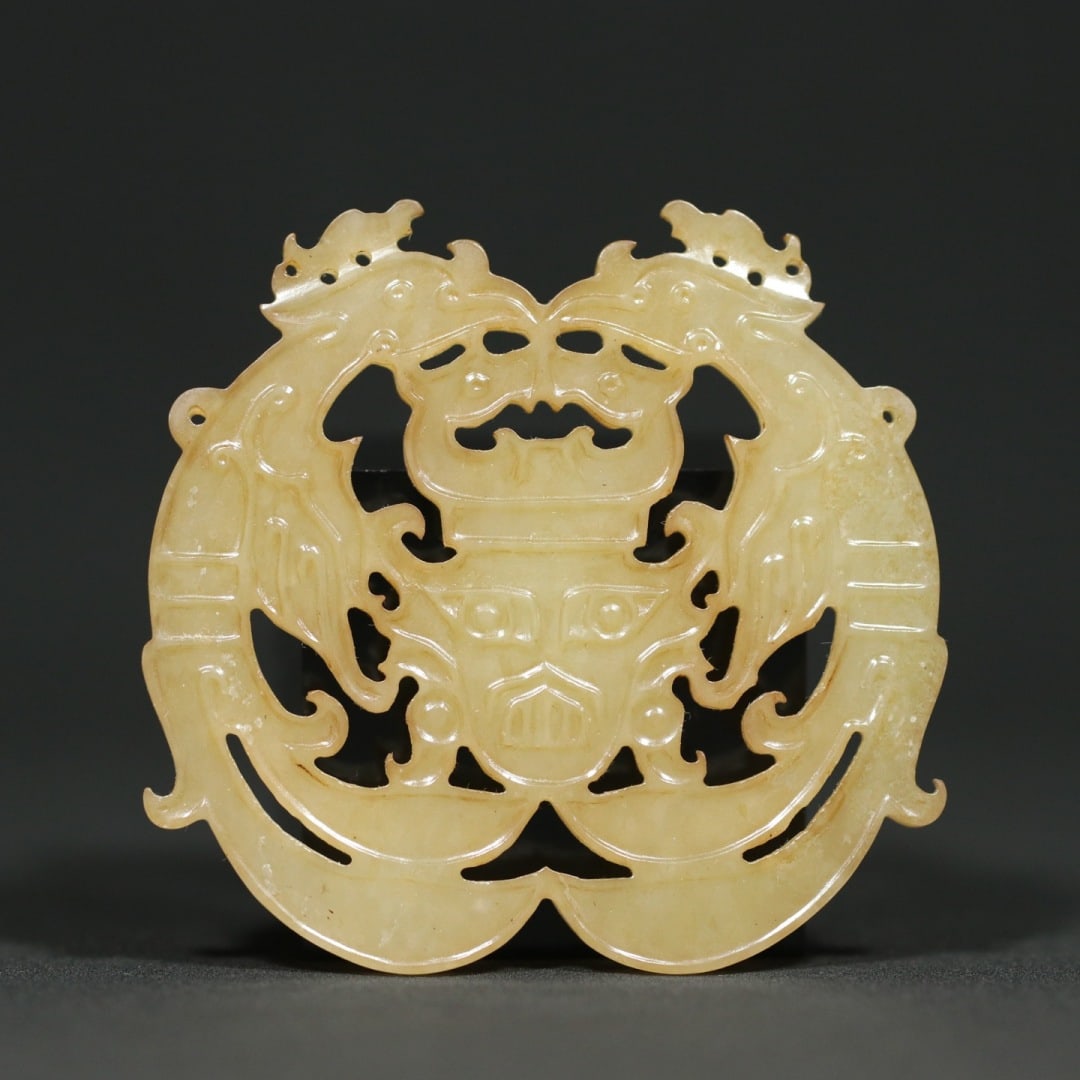 An Exquisite White Jade Phoenix Pattern Pendant: An Exquisite White Jade Phoenix Pattern Pendant Shi jia he Culture Size:2.4inx2.5inx0.2in Weight:33.1g白玉双凤人首纹玉璧挂件