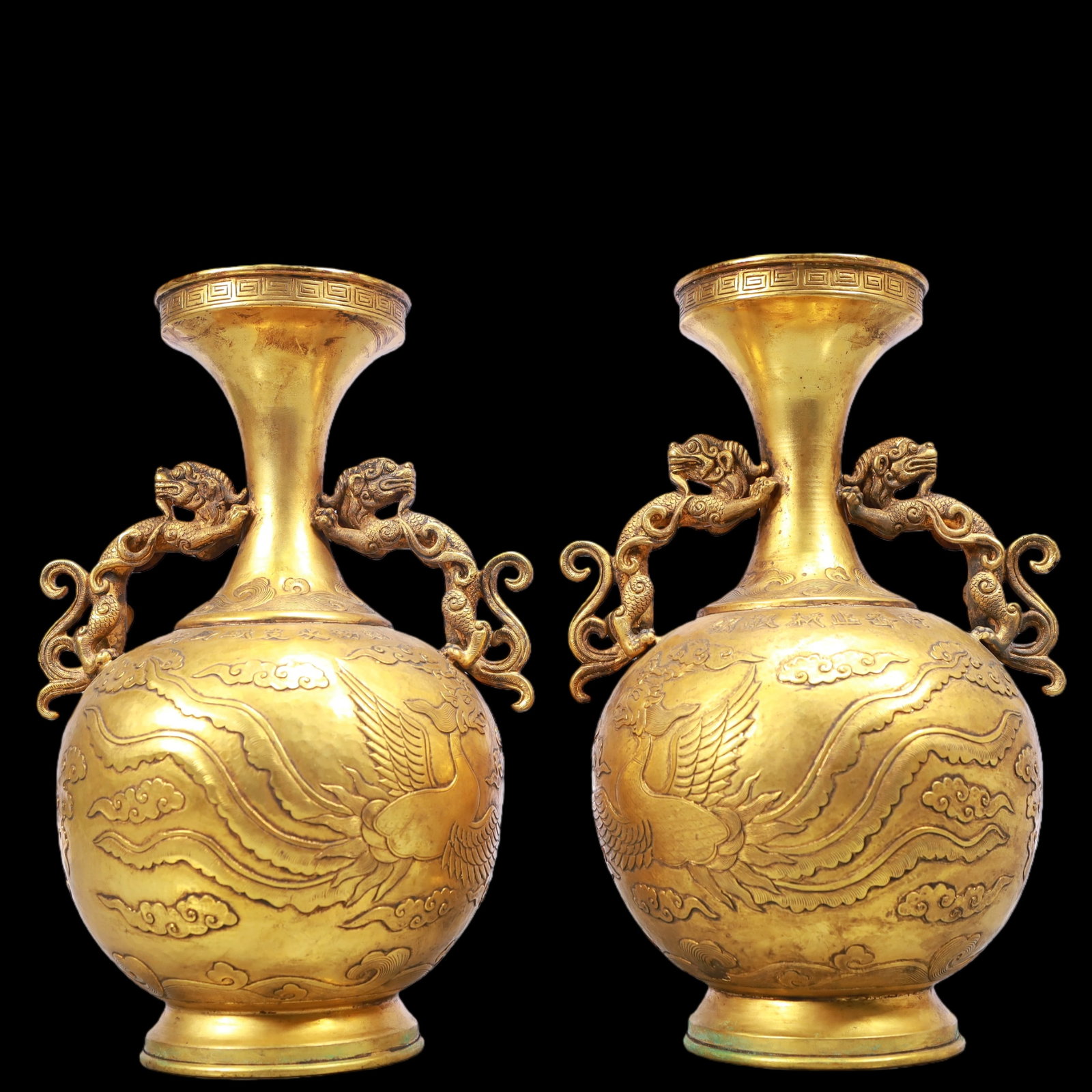 A Exquisite A pair of Gilt Bronze Phoenix Pattern Double-Ears Vase: A Exquisite A pair of Gilt Bronze Phoenix Pattern Double-Ears Vase Ming Dynasty, China Size:6.7inx10.2in Weight:3000g一对铜鎏金凤纹双耳瓶