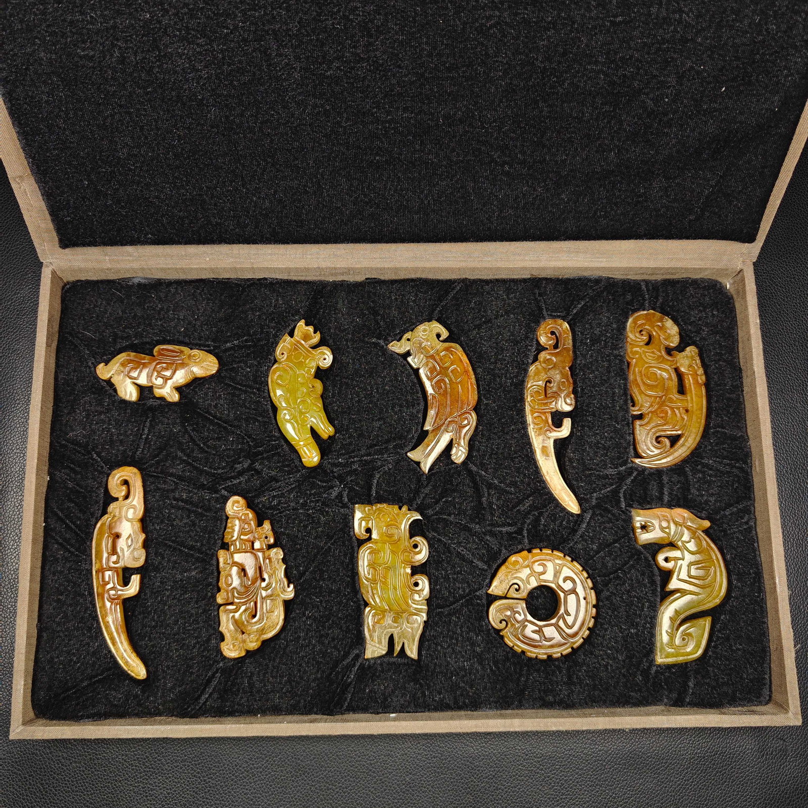 A Set of Fine White Jade With Inscription Auspicious Beast Ornament: A Set of Fine White Jade With Inscription Auspicious Beast Ornament Han Dynasty, China Size:2.4inx1.4in Size:4.5inx2.4in Weight:447g白玉佩一套