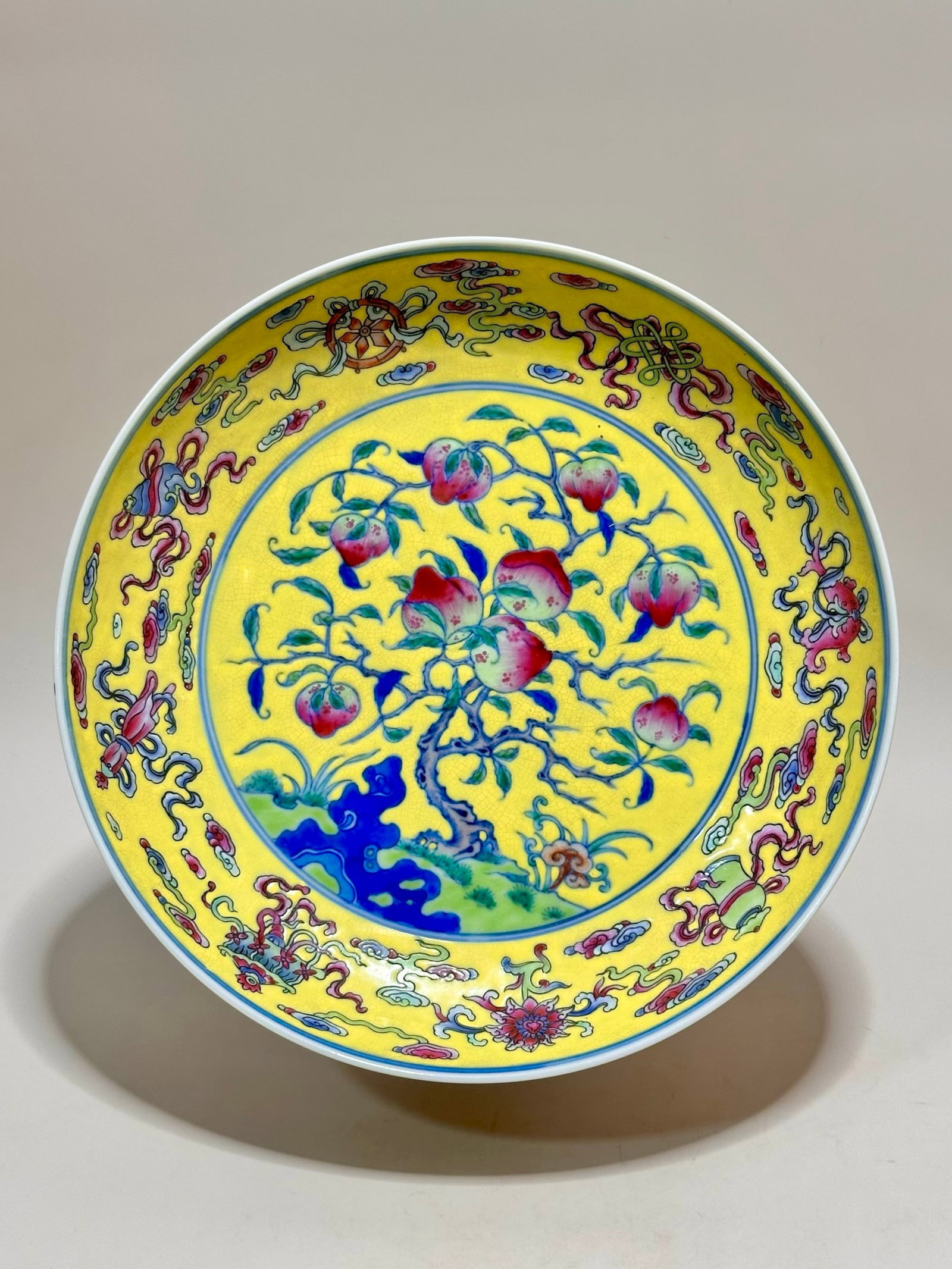 An Exquisite Yellow Ground Enamel Eight Treasures Pattern Plate (1 of 6)