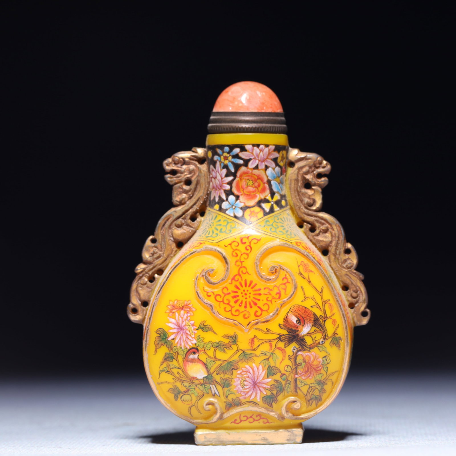 An Exquisite Glass Flower and Bird Pattern Double-Ears Snuff Bottle: An Exquisite Glass Flower and Bird Pattern Double-Ears Snuff Bottle,Qing Dynasty,China,Size:2inx0.8inx3.1in,Weight:134.1g 琉璃花鸟纹双耳鼻烟ࣥ