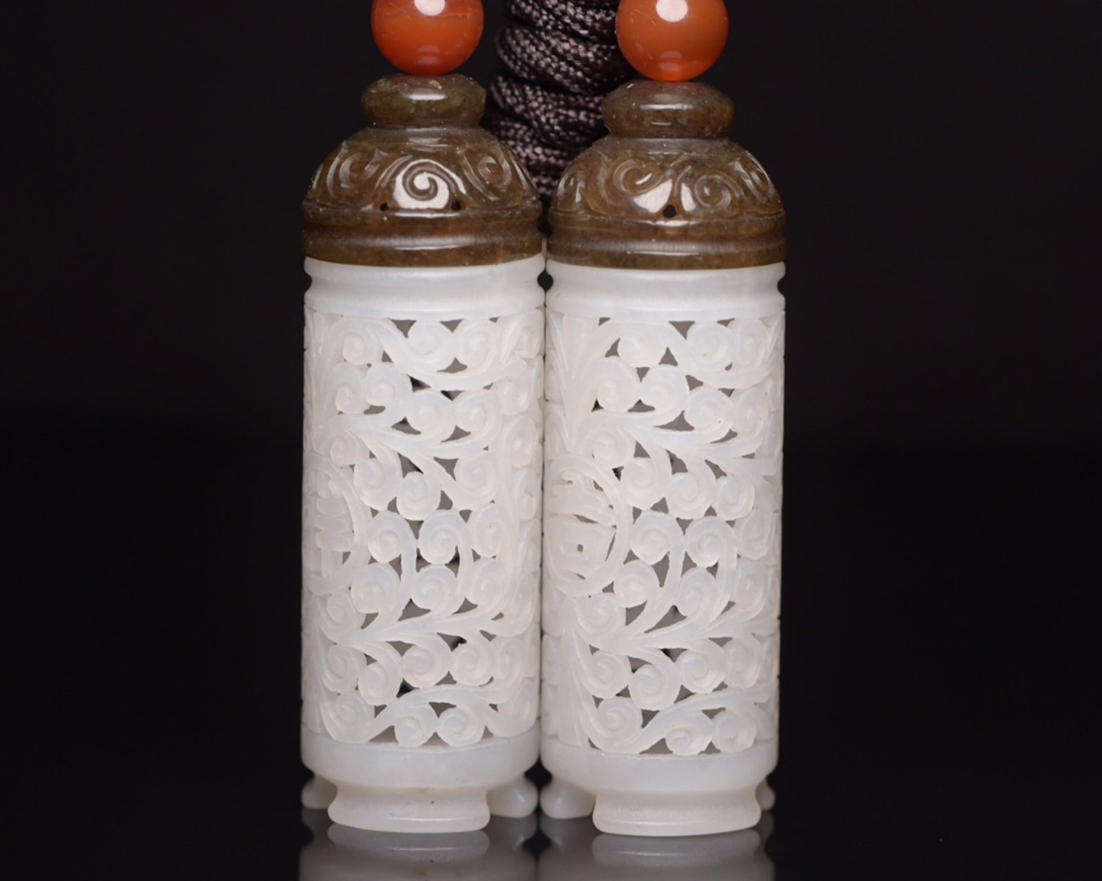 A Pair of Exquisite White Jade Flower Pattern Pendants: A Pair of Exquisite White Jade Flower Pattern Pendants,Qing Dynasty,China,Size:2.6inx0.9inx0.9in,Weight:55g 一对白玉花卉纹挂件,中国