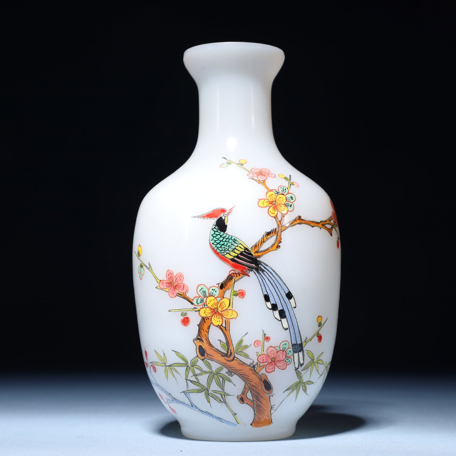 An Exquisite Glass Flower and Bird Pattern Vase: An Exquisite Glass Flower and Bird Pattern Vase,Qing Dynasty,China,Qianlong Four-character Mark,Size:3.5inx7.1in,Weight:462g 琉璃花鸟纹瓶,中国清&#