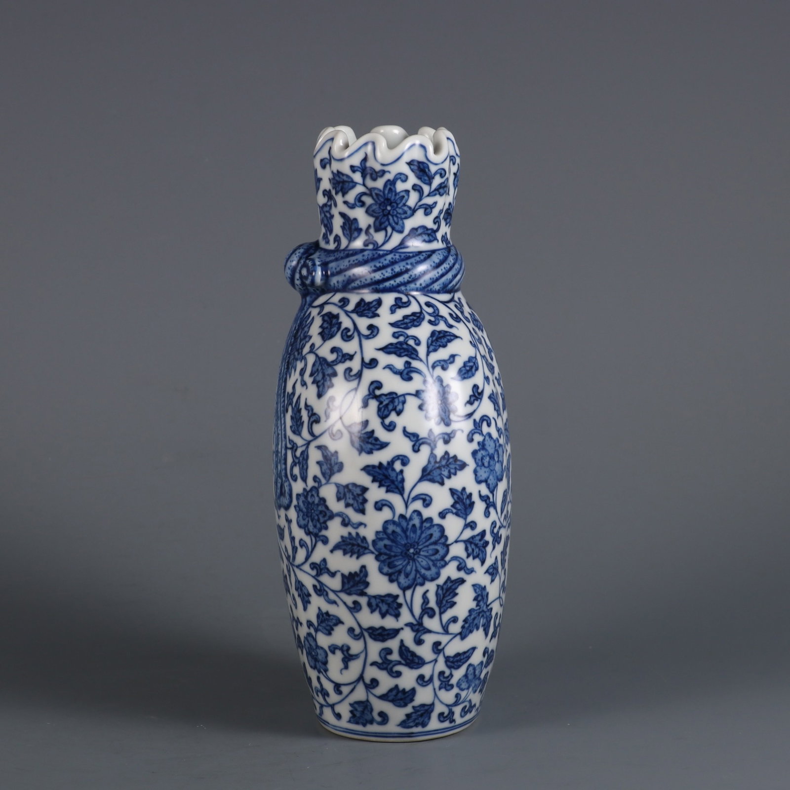 An Exquisite Blue and White Lotus Pattern Vase: An Exquisite Blue and White Lotus Pattern Vase,Qing Dynasty,China,Qianlong Six-character Mark,Size:8.3inx4.5in