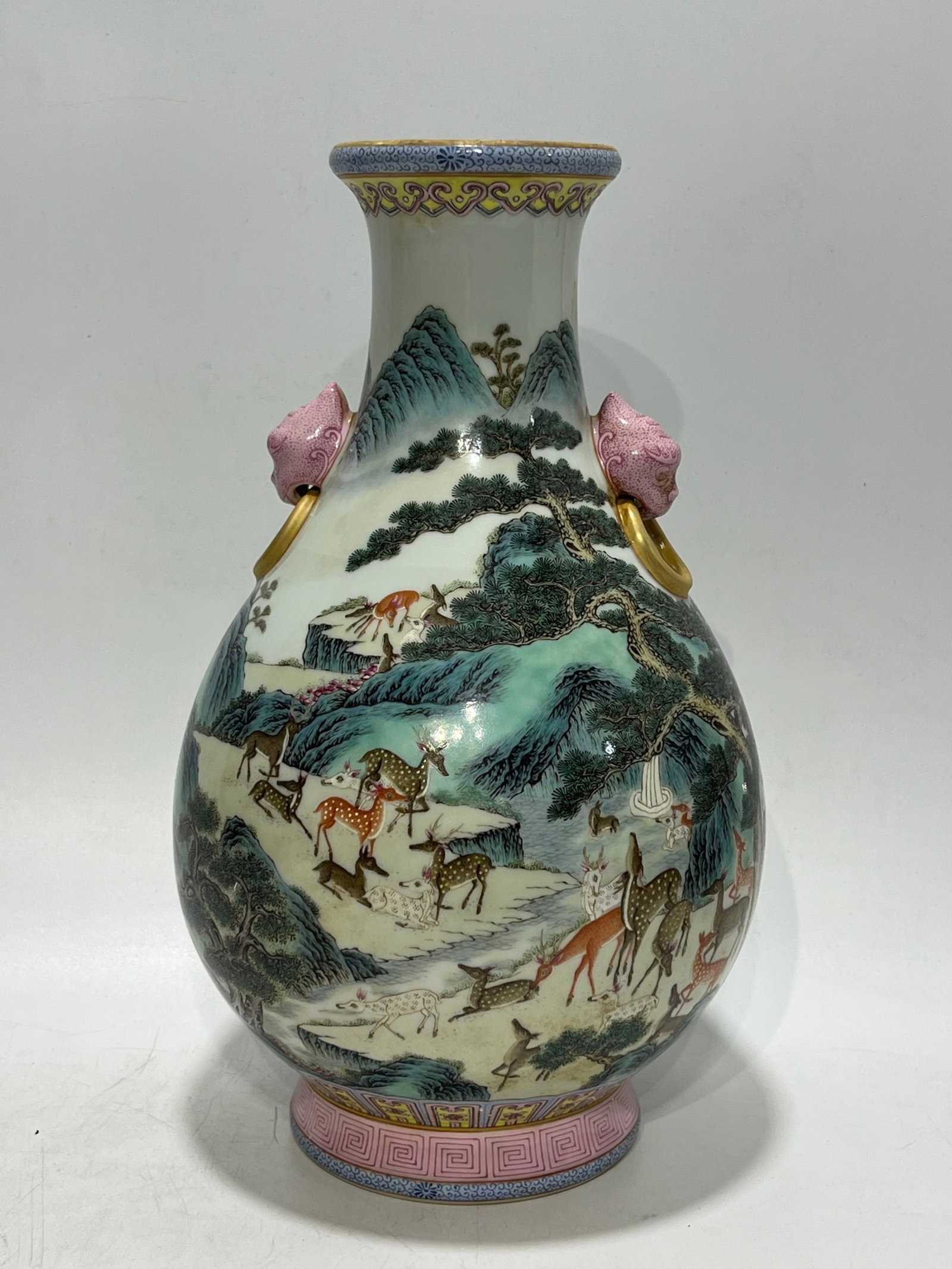 A Rare Famille-Rose Painted Gold Pine and Deer Pattern Beast-Ears Vase: A Rare Famille-Rose Painted Gold Pine and Deer Pattern Beast-Ears Vase,Qing Dynasty,China,Qianlong Six-character Mark,Size:12.2in