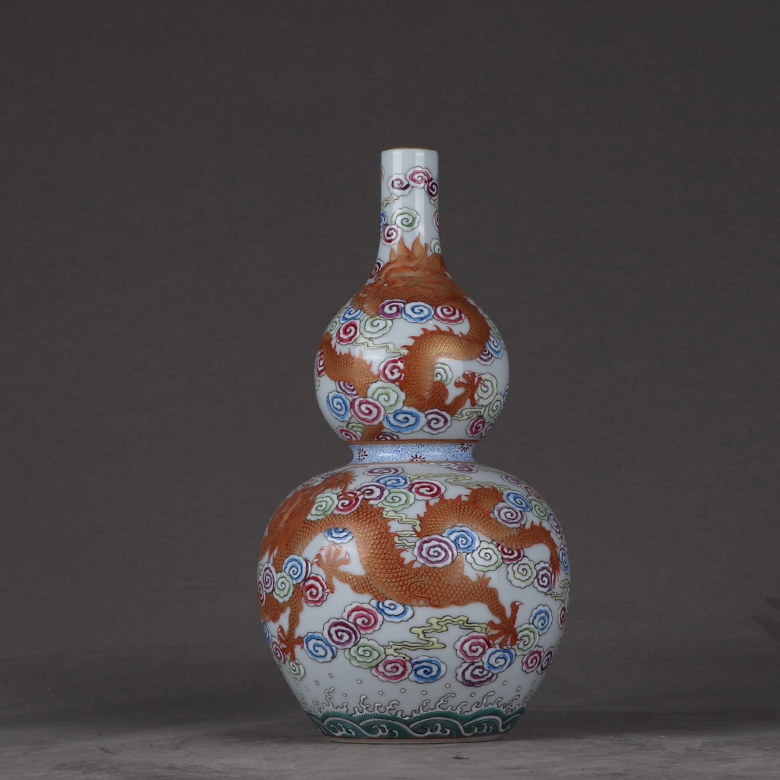 An Exquisite Famille-Rose Painted Gold Auspicious Cloud and Dragon Pattern Gourd-Shaped Vase: An Exquisite Famille-Rose Painted Gold Auspicious Cloud and Dragon Pattern Gourd-Shaped Vase,Qing Dynasty,China,Yongzheng Six-character Mark,Size:8.7inx4.7in 粉彩描金祥&#