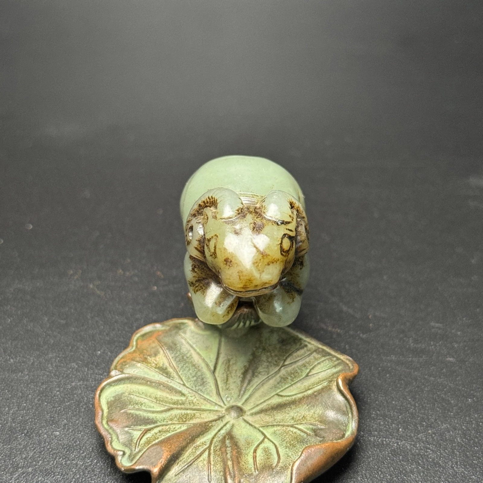 An Exquisite White Jade Sheep Ornament: An Exquisite White Jade Sheep Ornament,Qing Dynasty,China,Size:1.8inx1inx0.9in,Weight:40g 白玉羊摆件,中国清代