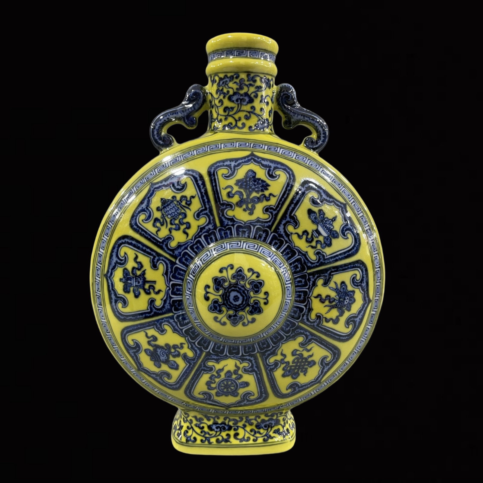 A Rare Yellow Ground Blue and White Eight Treasures Pattern Double-Ears Vase: A Rare Yellow Ground Blue and White Eight Treasures Pattern Double-Ears Vase,Qing Dynasty,China,Qianlong Six-character Mark,Size:12.8inx9.1in 黄地青花八宝纹&#