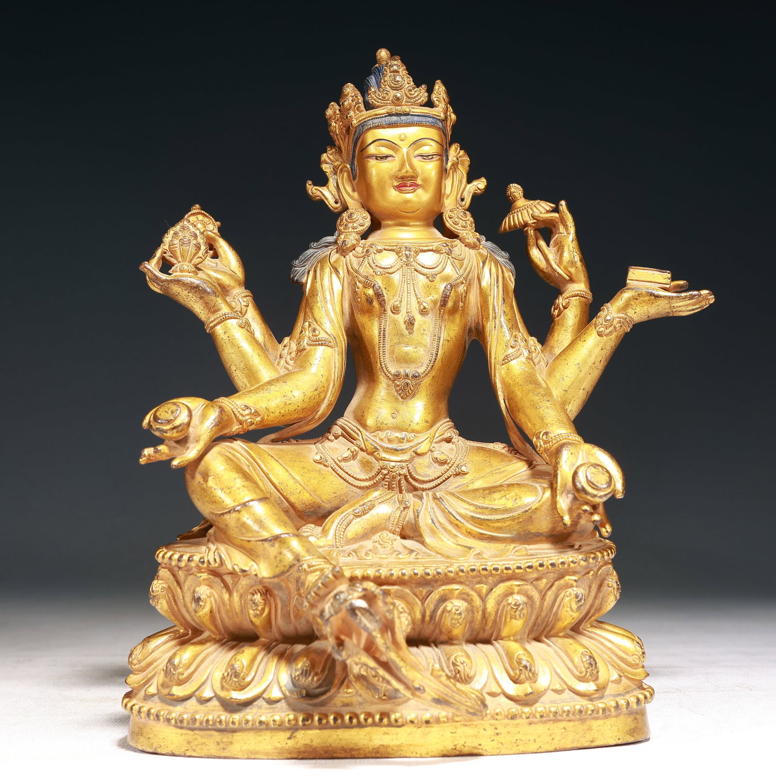 A Solemn Gilt Bronze Buddha Statue: A Solemn Gilt Bronze Buddha Statue,Qing Dynasty, China,Size:6.7inx6.3inx10.2in,Weight:4650g 铜鎏金佛像,中国清代