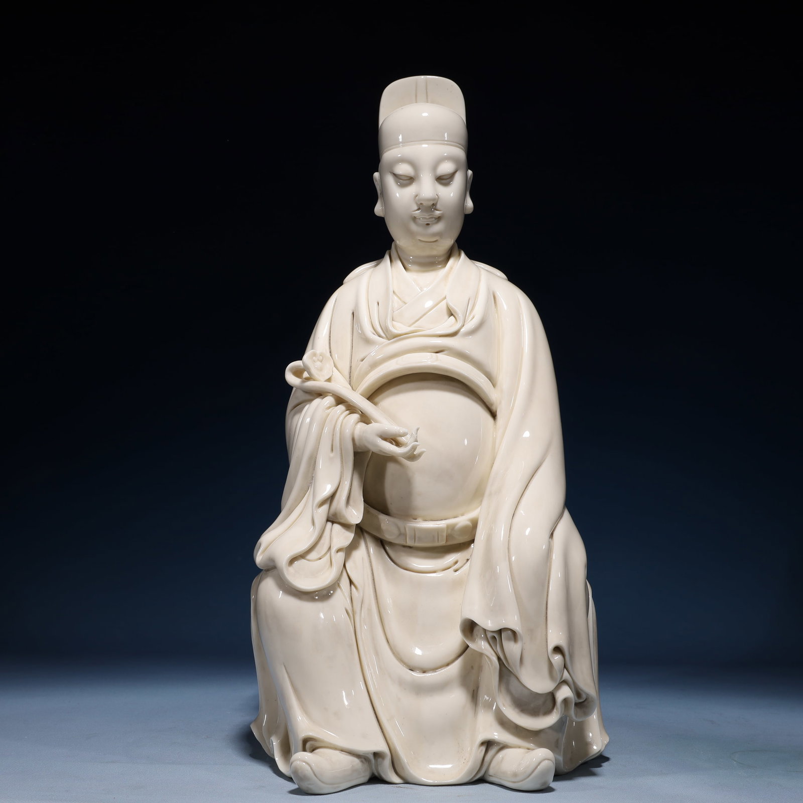 A Solemn Blance-De-Chine Statue of Figure: A Solemn Blance-De-Chine Statue of Figure Blance-De-Chine Statue of Figure,Ming Dynasty,China,He Chaozong Mark,Size:8.3inx7.1inx16.9in,Weight:4750g
