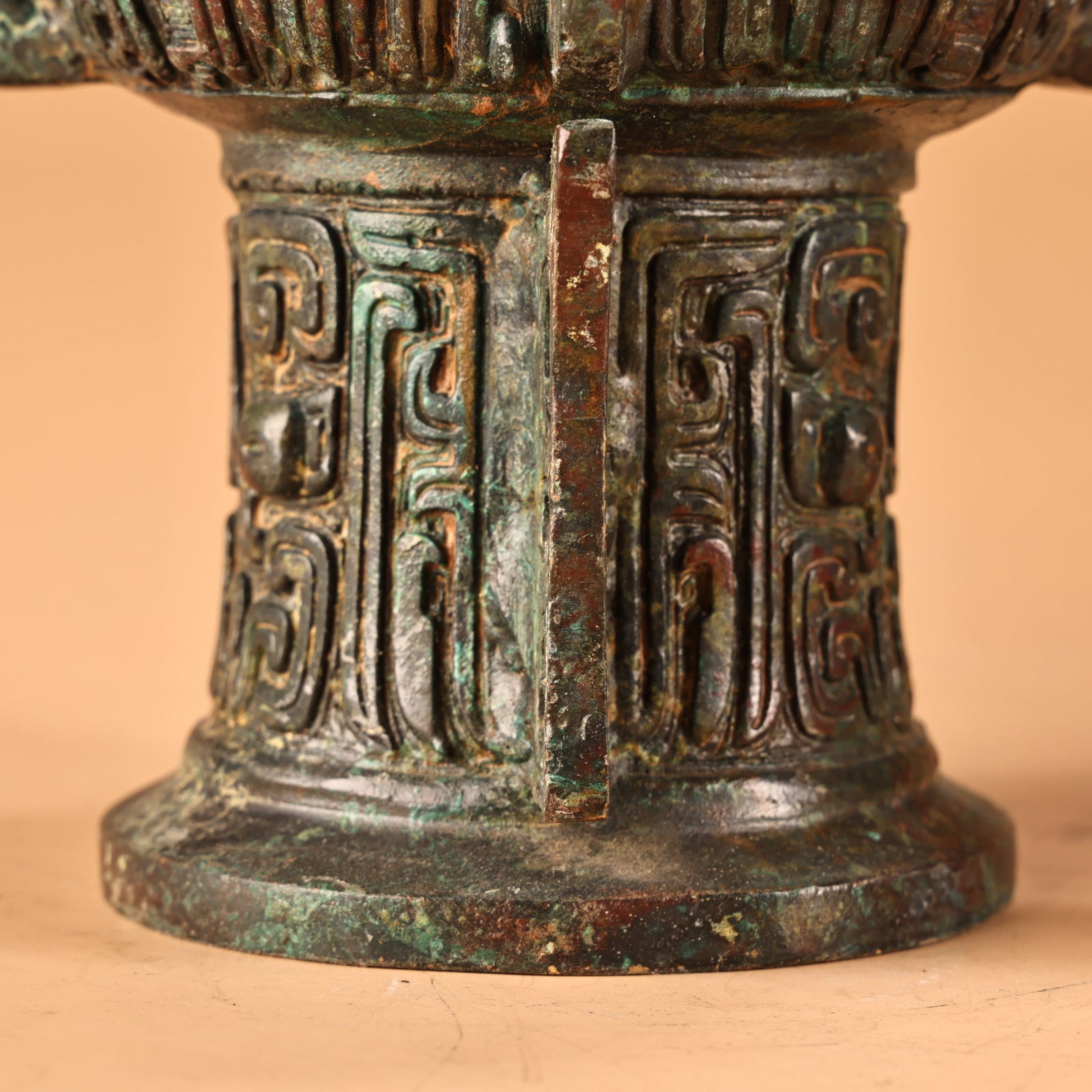 An Archaic Bronze Beast-Face Pattern Libation Cup - 11