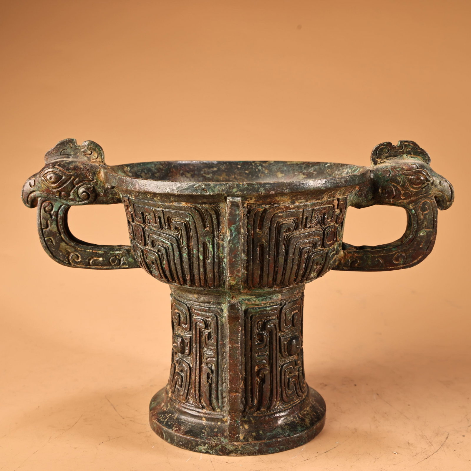 An Archaic Bronze Beast-Face Pattern Libation Cup (1 of 11)