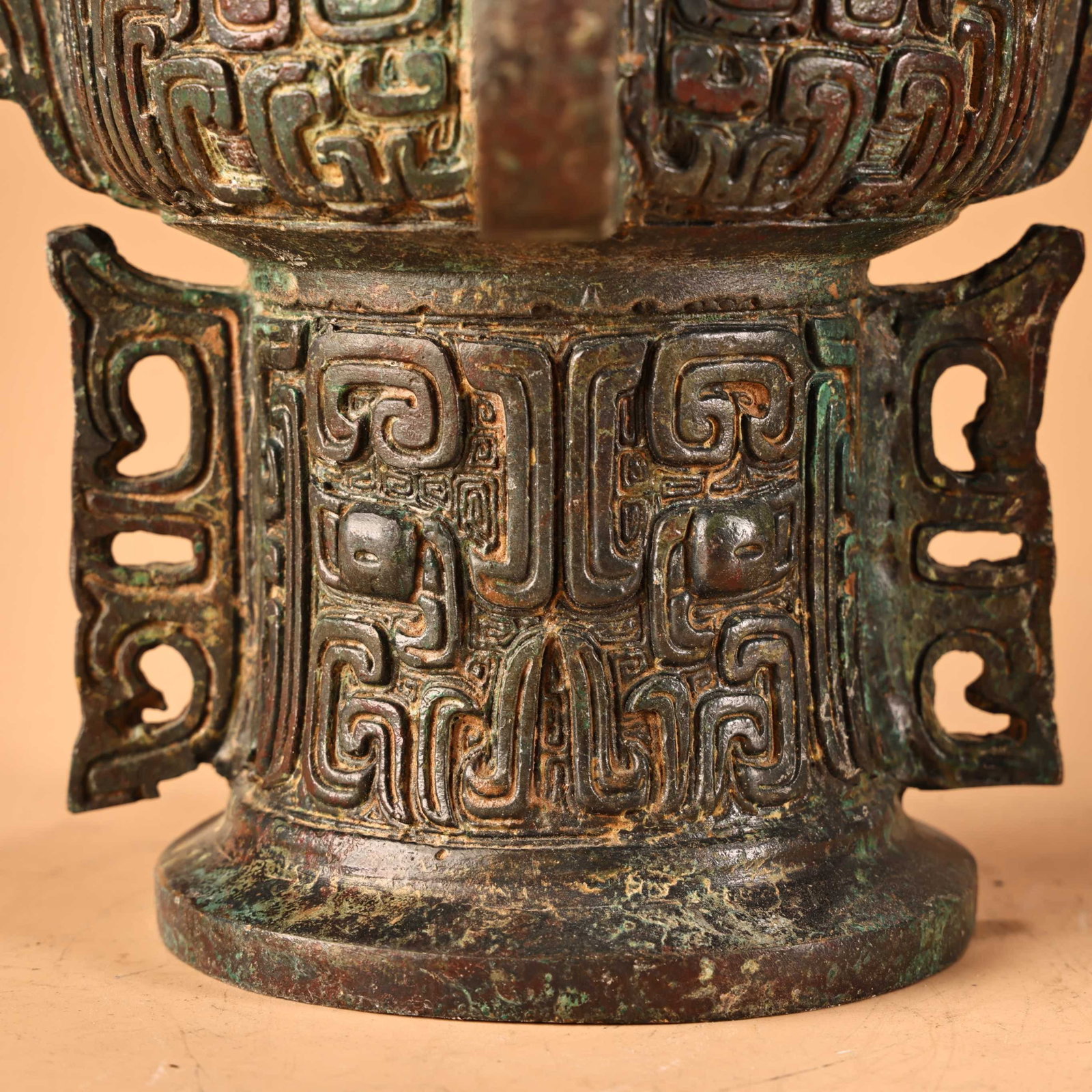 An Archaic Bronze Beast-Face Pattern Libation Cup - 7