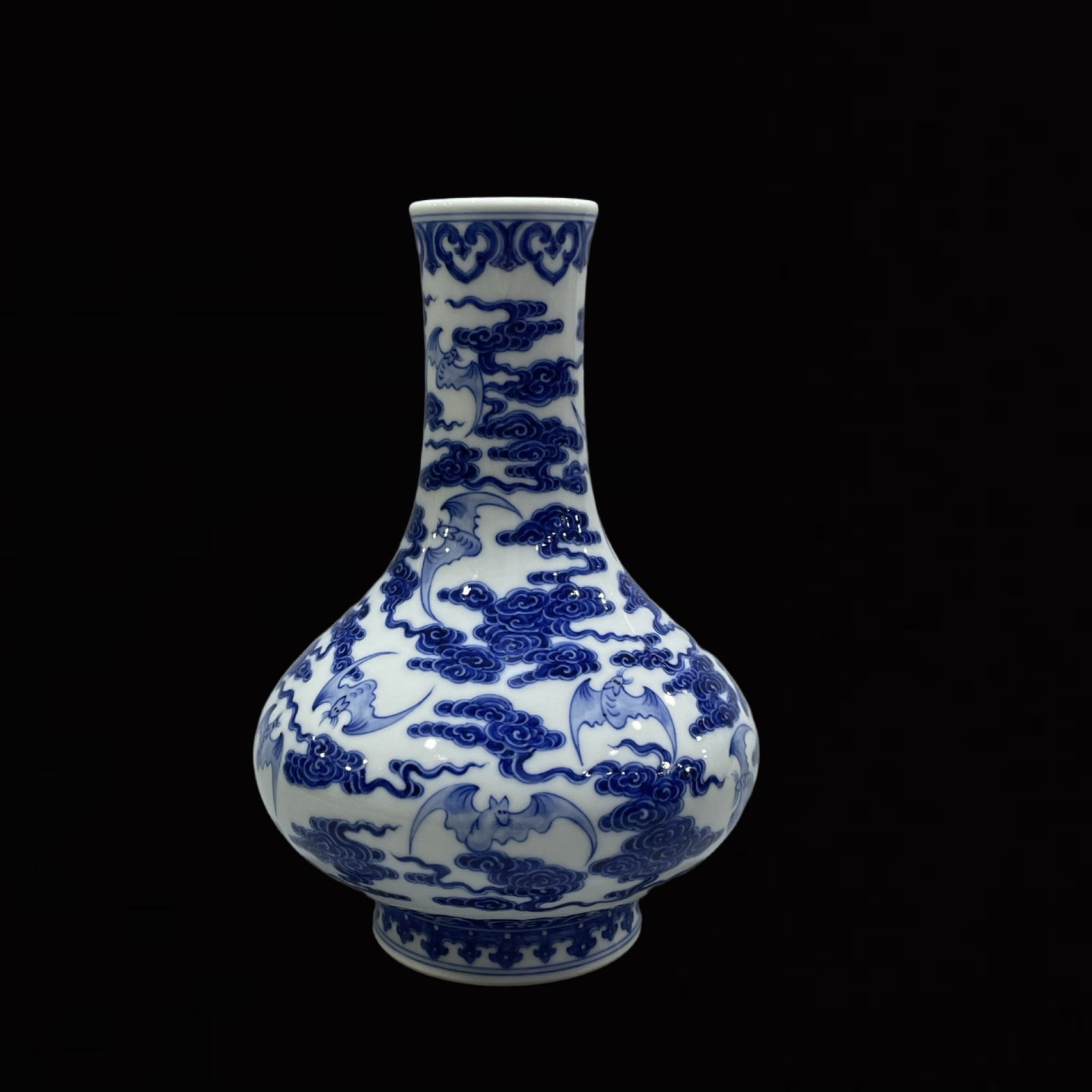 An Exquisite Blue and White Auspicious Cloud and Bats Pattern Vase: An Exquisite Blue and White Auspicious Cloud and Bats Pattern Vase,Qing Dynasty,China,Qianlong Six-character Mark,Size:7.9inx5.3in