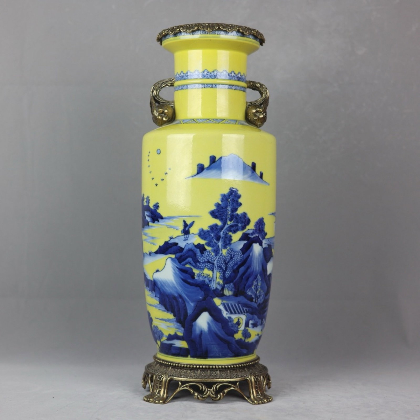 A Huge Yellow Ground Blue and White Inlaid Bronze Landscape and Figure Pattern Pomegranate-Ears Vase: A Huge Yellow Ground Blue and White Inlaid Bronze Landscape and Figure Pattern Pomegranate-Ears Vase,Qing Dynasty,China,Kangxi Six-character Mark,Size:19.9inx5.9inx7.1inx6.9in