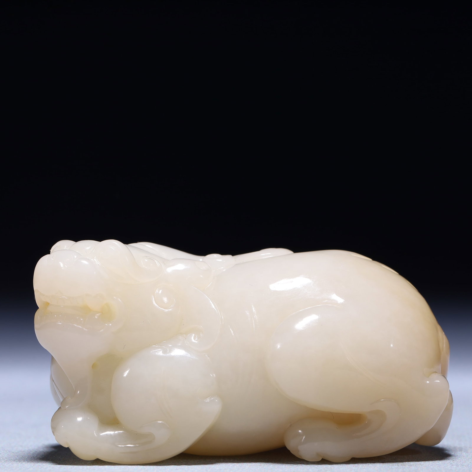 An Exquisite White Jade Wealth-Attracting Creature Ornament (1 of 10)