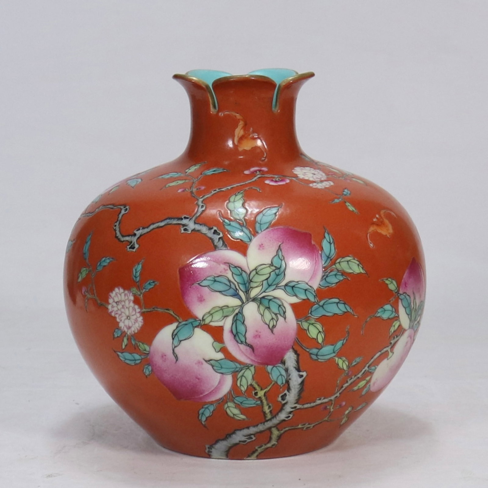 An Exquisite Coral Red Glazed Bats and Peach Pattern Vase: An Exquisite Coral Red Glazed Bats and Peach Pattern Vase,Qing Dynasty,China,Qianlong Six-character Mark,Size:8.1inx3.1in