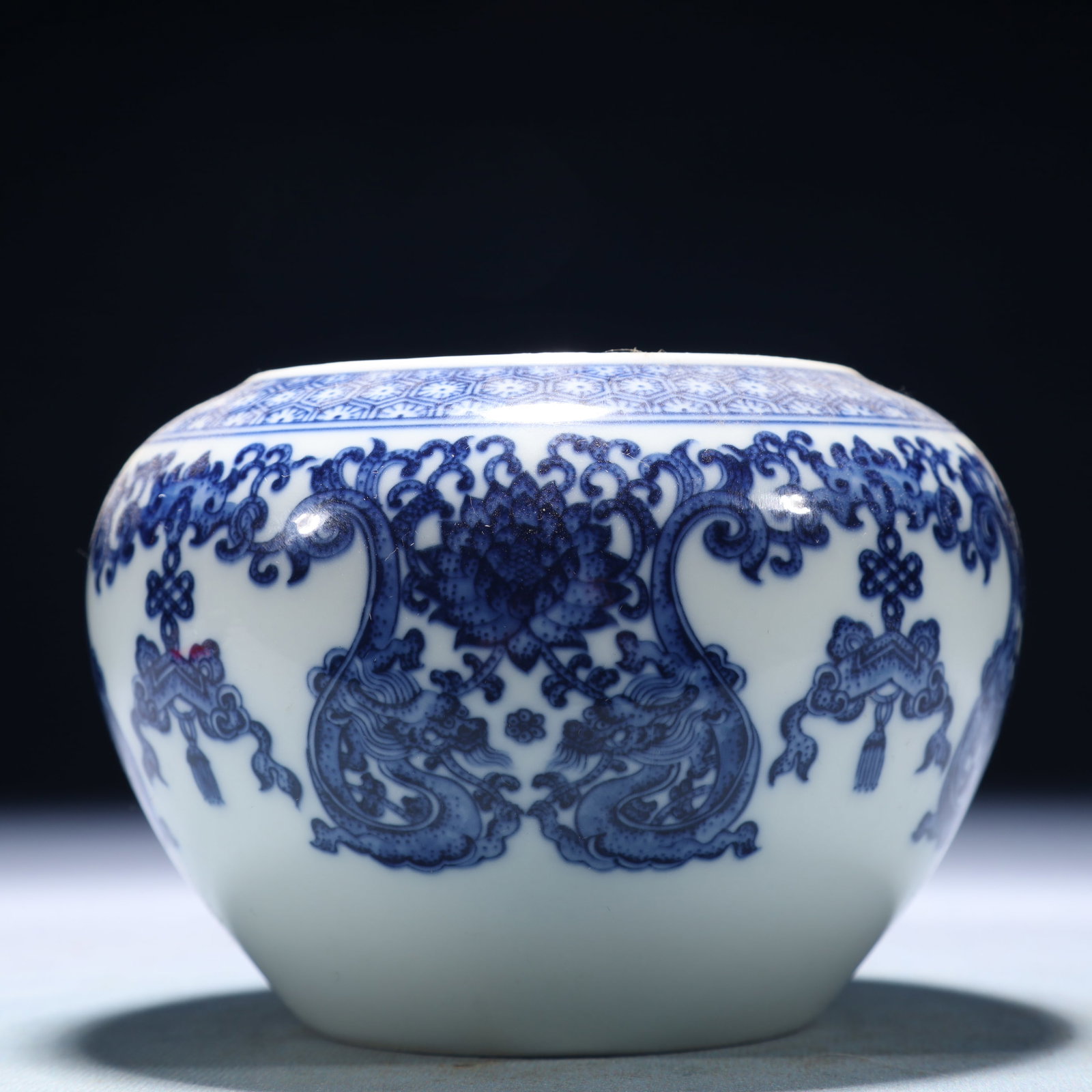 An Exquisite Blue and White Lotus and Dragon Pattern Jar: An Exquisite Blue and White Lotus and Dragon Pattern Jar,Qing Dynasty,China,Yongzheng Six-character Mark,Size:5.1inx3.5in,Weight:400g 青花缠枝莲龙纹罐,&